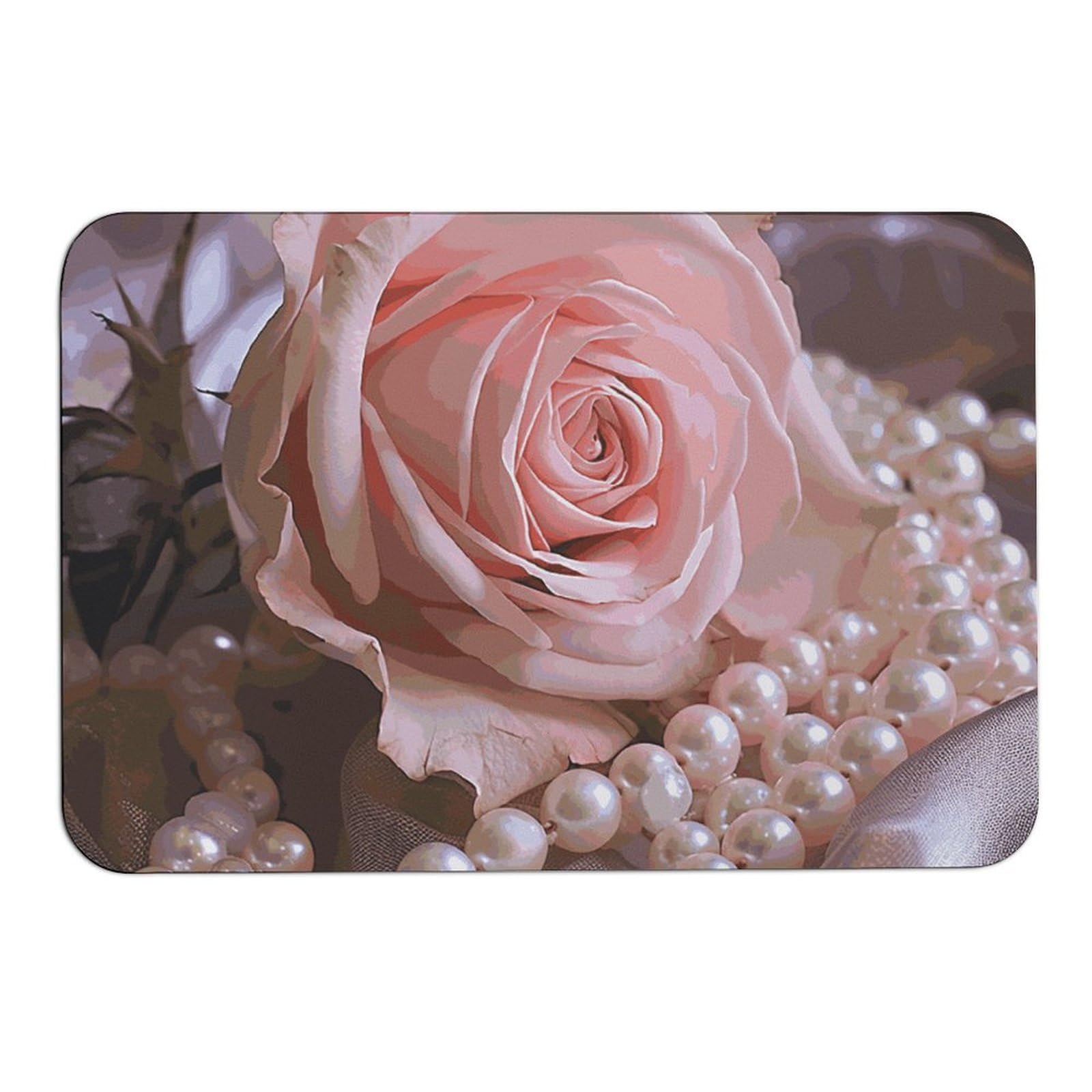 Tapis absorbant pour une entrée propre - Tapis rose et perles de sol maison