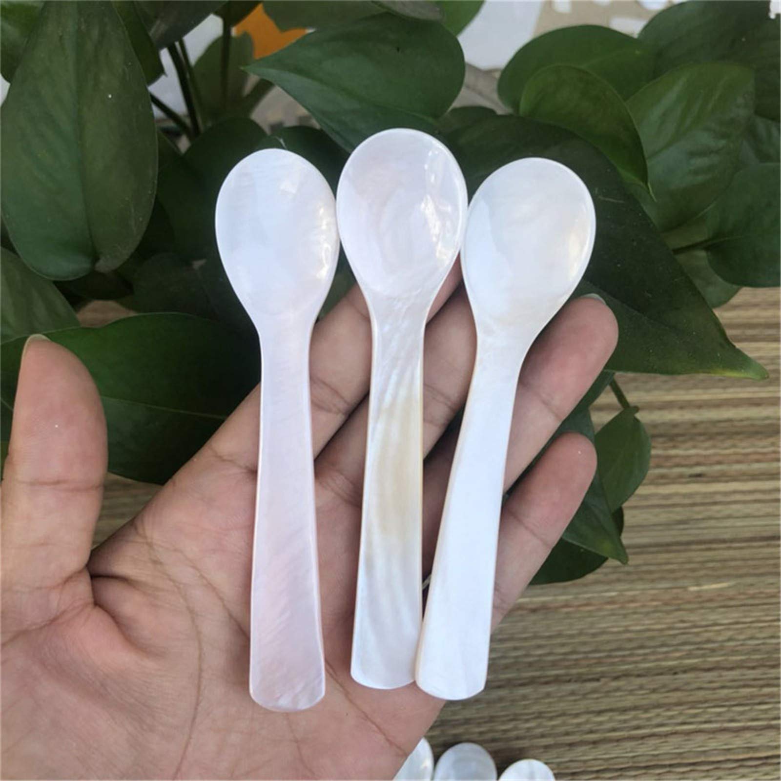 Cucchiaio per annaffiare in silicone con manico rotondo Rösle