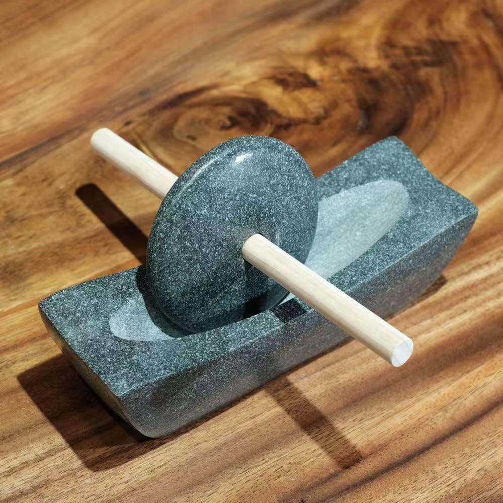 Bluestone roller, tea grinding in Song Dynasty, small stone mortar, roller, matcha tea powder production, tea cake grinding, coffee bean grinding.