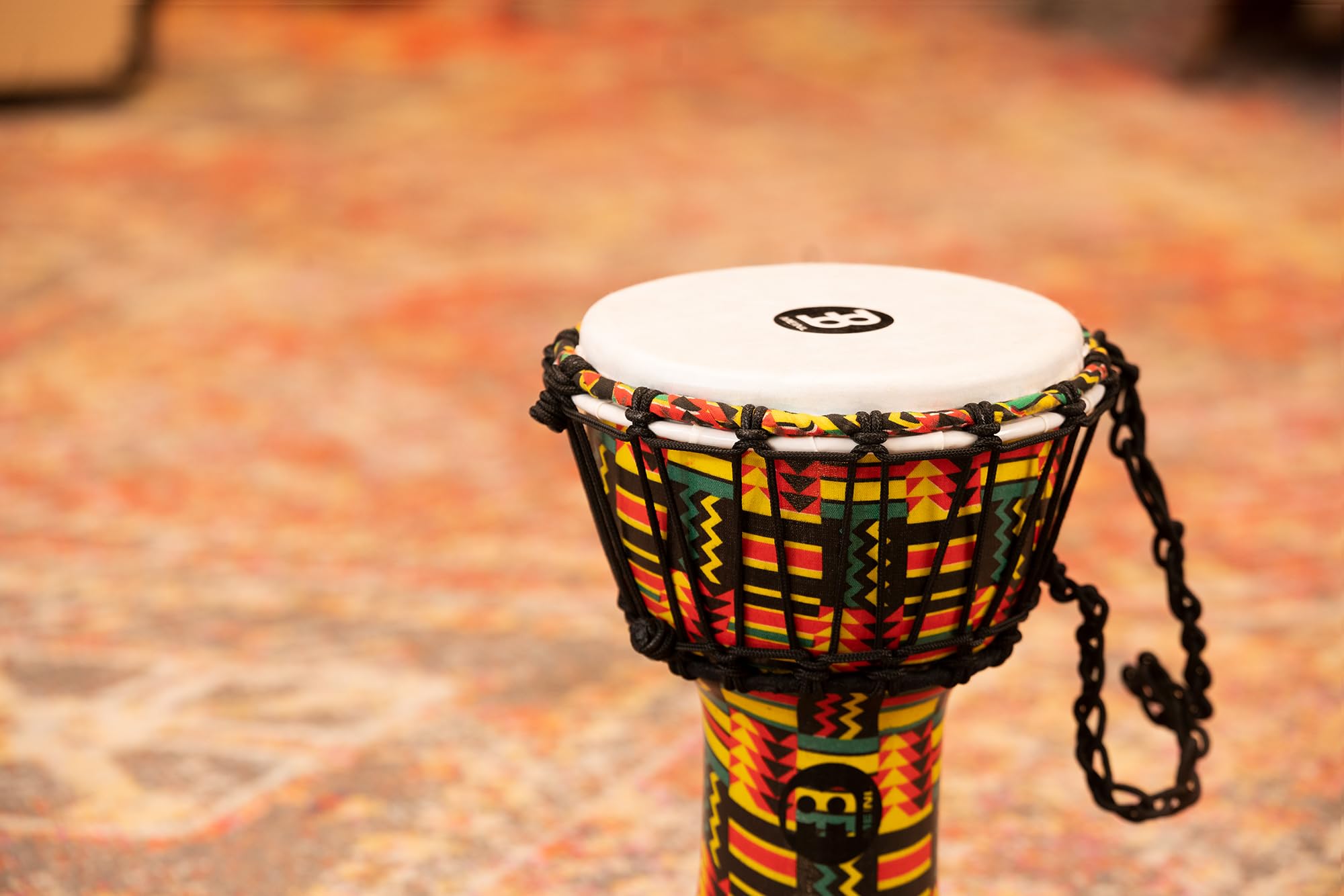 Meinl Percussion Djembe Junior con carcasa sintética y cabeza, acabado Simbra - NO HECHO EN CHINA - Tamaño compacto de 7 pulgadas, cuerda ajustada, garantía de 2 años (JRD-SI)
