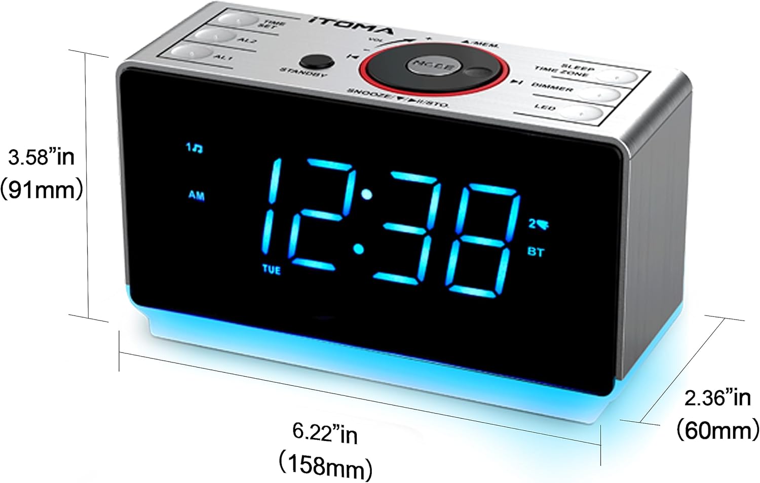 The iTOMA CKS708 alarm clock radio with its blue night light illuminated, placed on a bedside table next to a lamp.