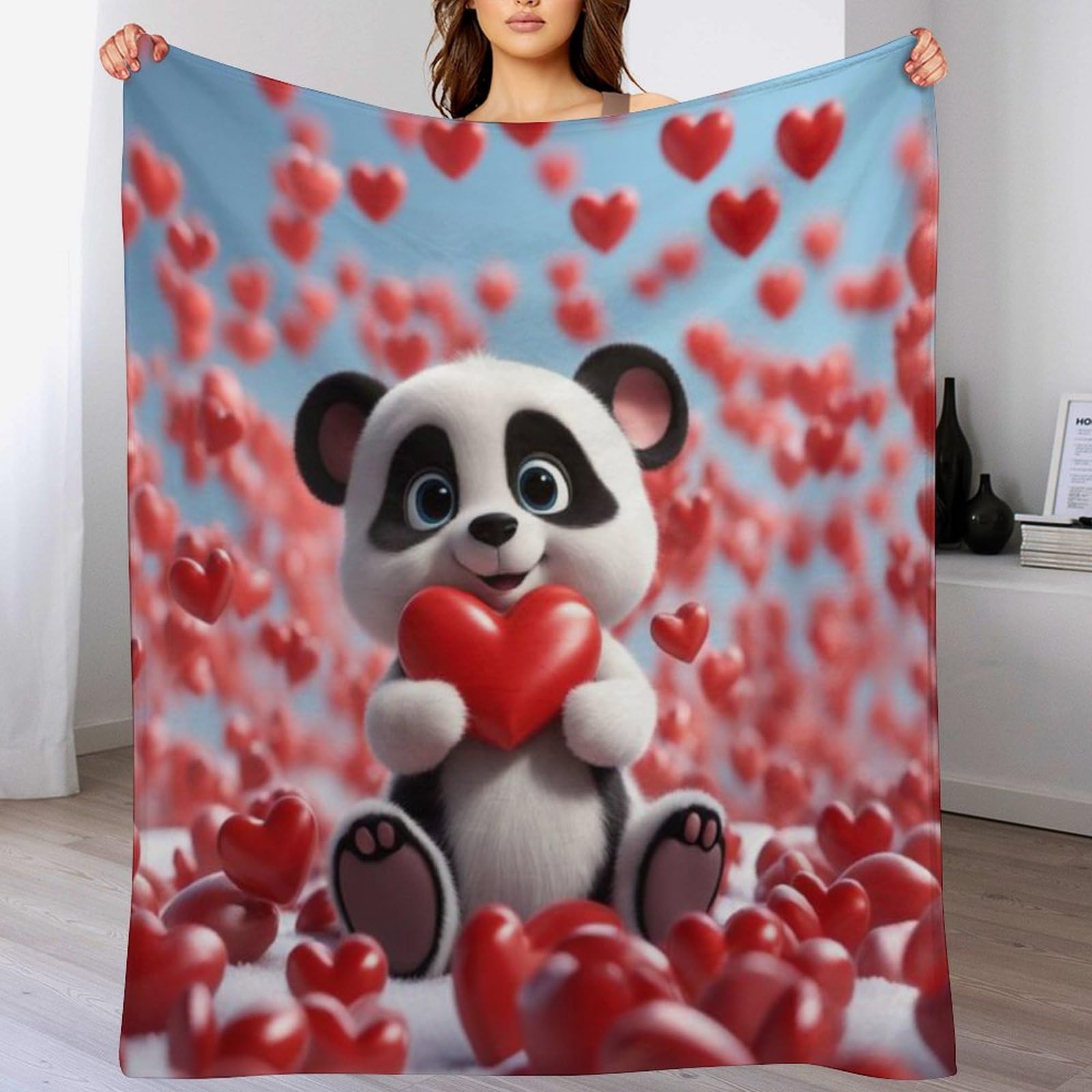 Couverture panda en flannel chaude pour stopper le froid sur le canapé