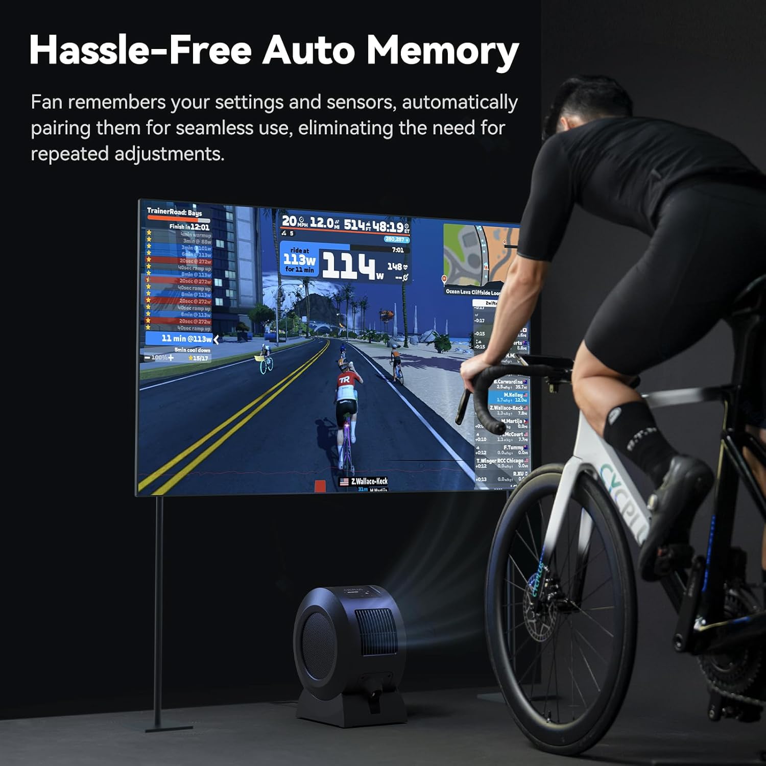 CYCPLUS F1 fan in an indoor cycling setup with a large screen displaying workout data