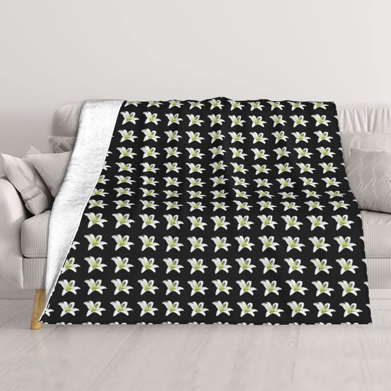 Couverture en peluche lys pour des soirées cocooning et vos voyages en camping