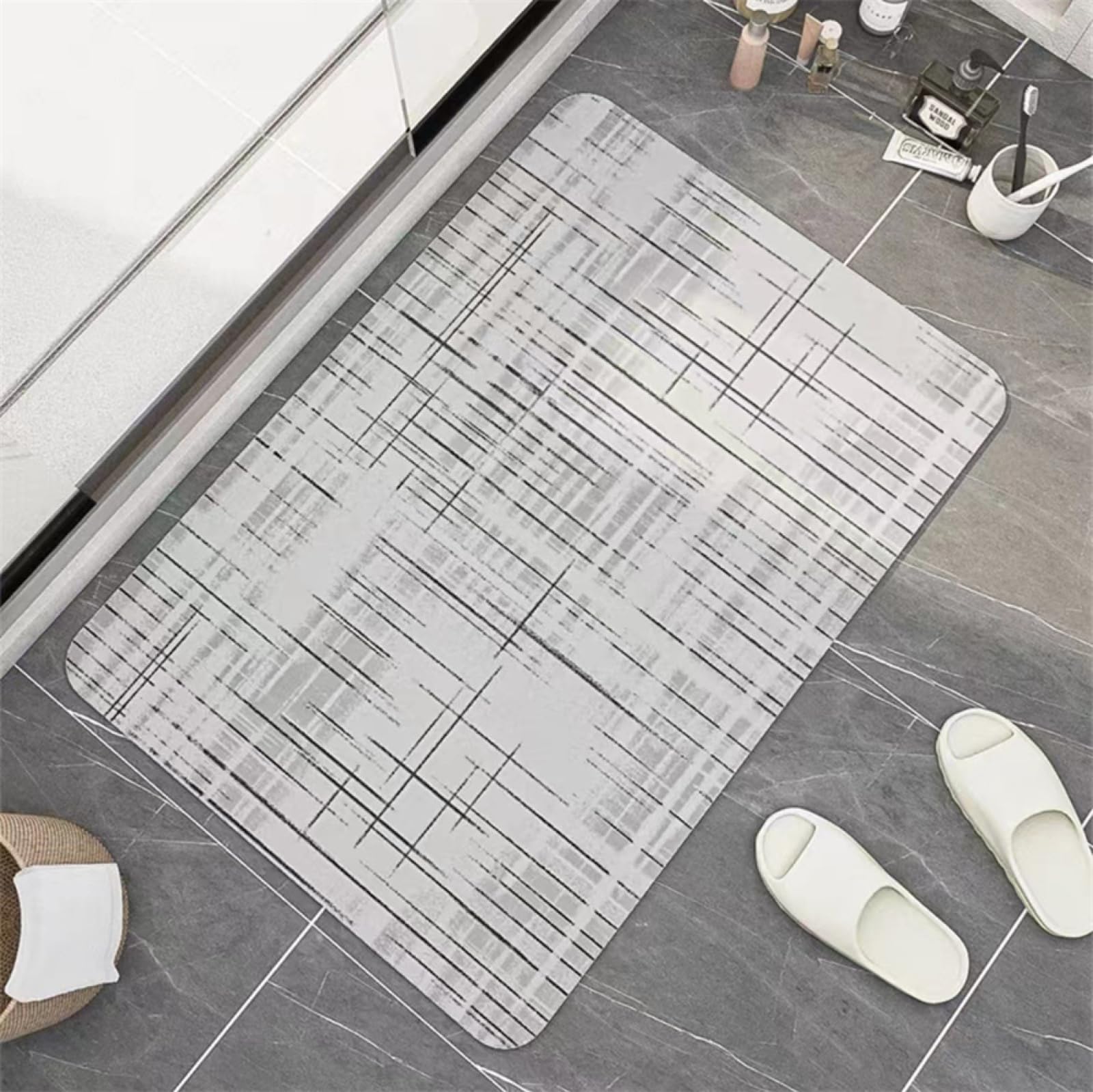 Alfombrilla ducha de secado rápido que elimina la humedad del suelo en gris claro