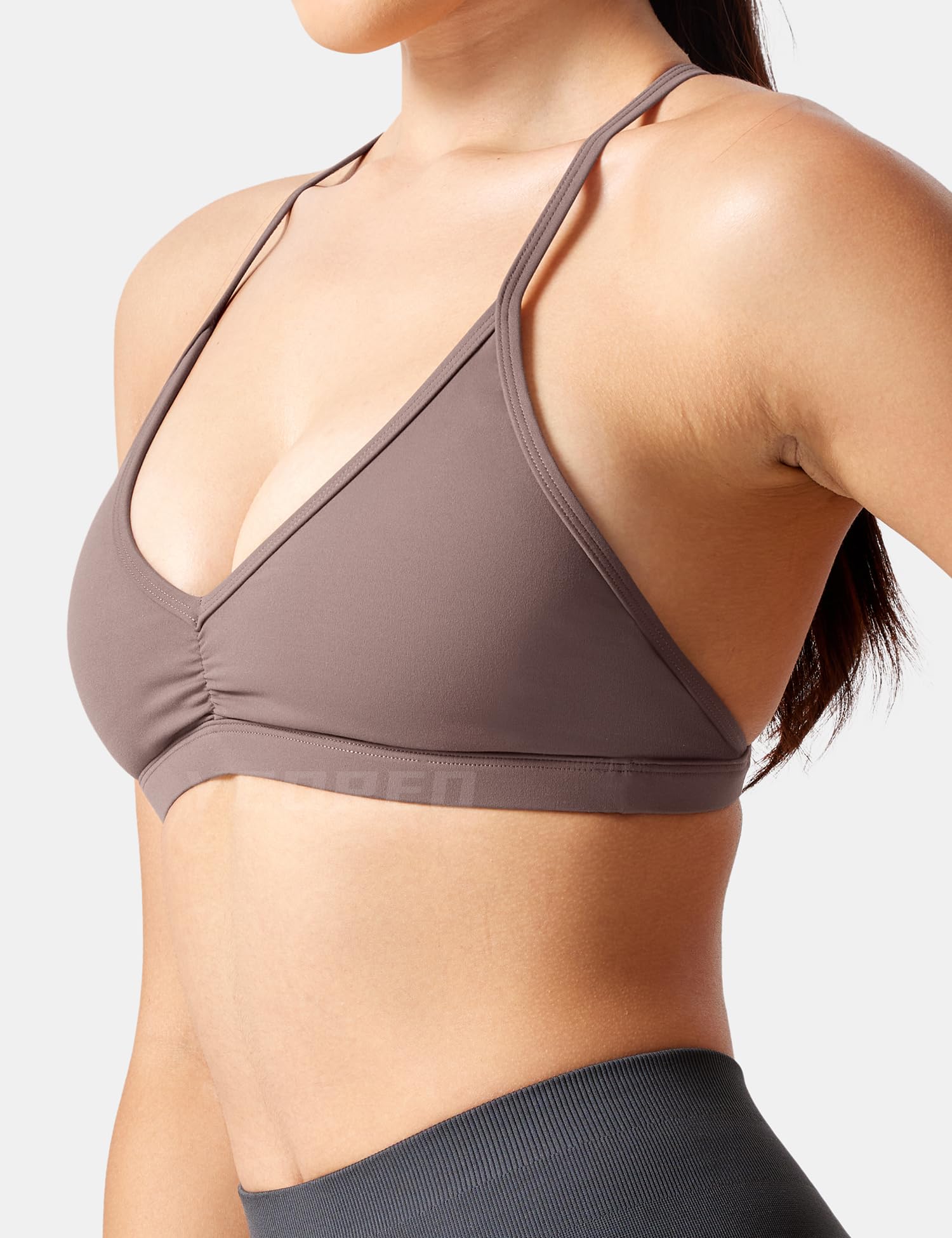 YEOREO Biustonosze sportowe dla kobiet wyściełany biustonosz treningowy bez pleców Karlena Low Impact Criss Cross Yoga Crop Tank Top