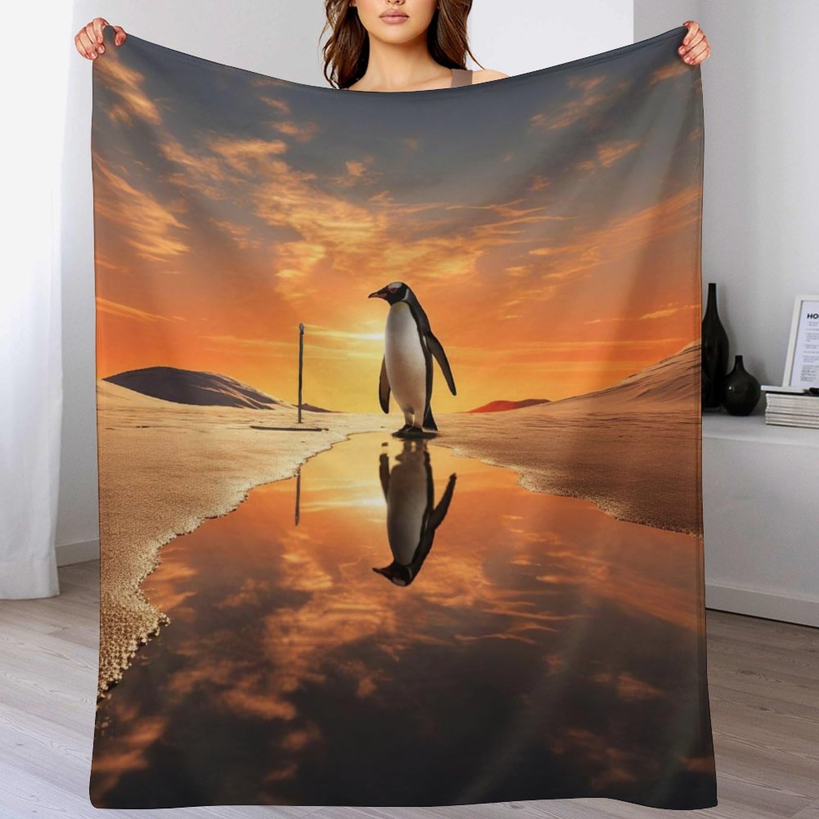 Couverture polaire manchot pour le canapé et soirées cocooning en famille