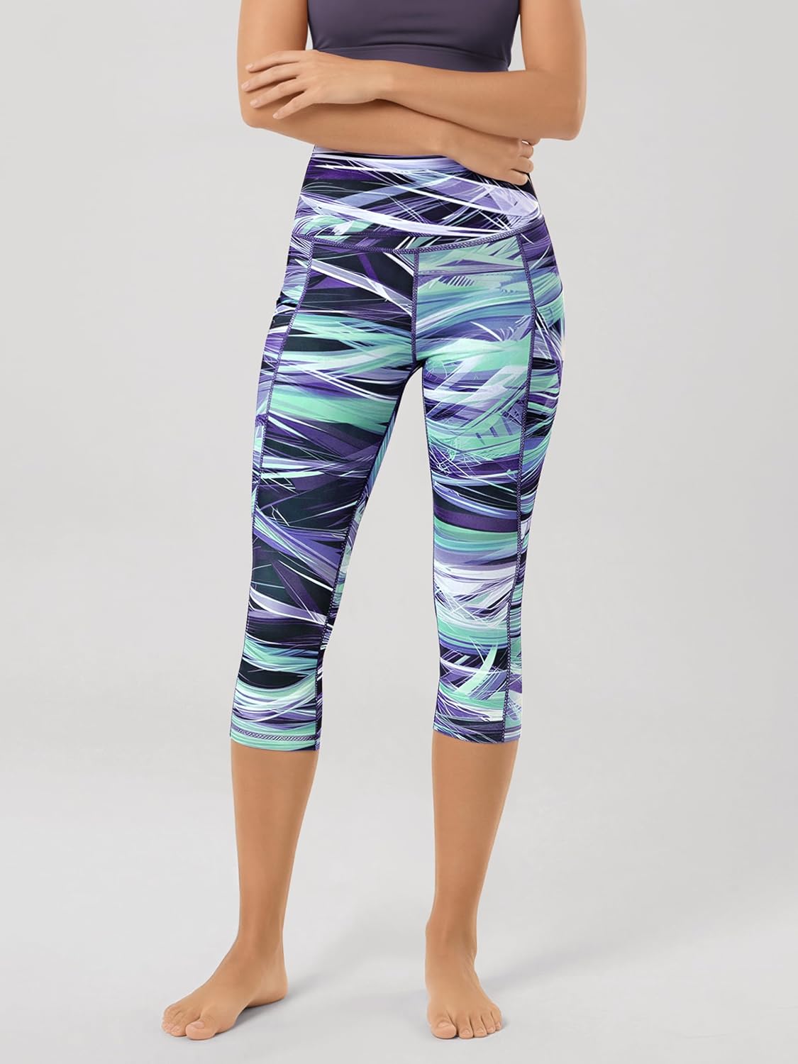 ODODOS Women's High Waisted Yoga Capris with Pockets, Tummy Control Non See Through Workout Athletic Running Capri Leggings image 2