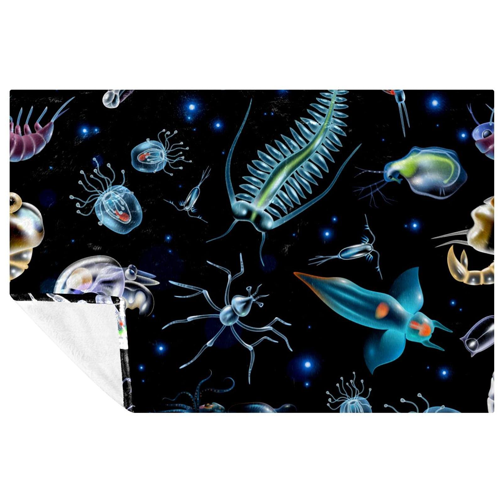 Couverture lumineuse plancton marin pour apaiser la peur du noir des petits et grands