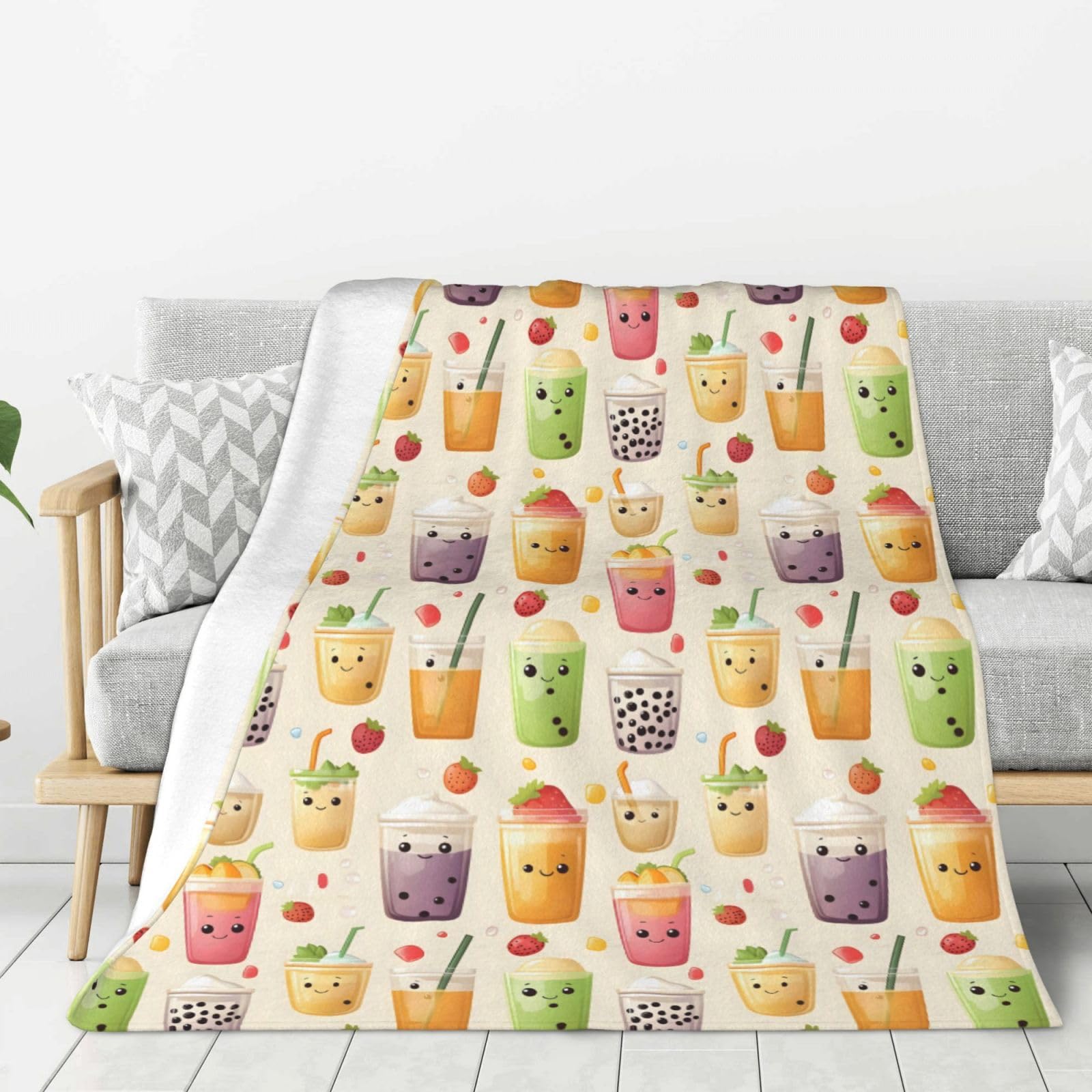 Couverture canapé motif thé au lait pour cocooning devant vos séries