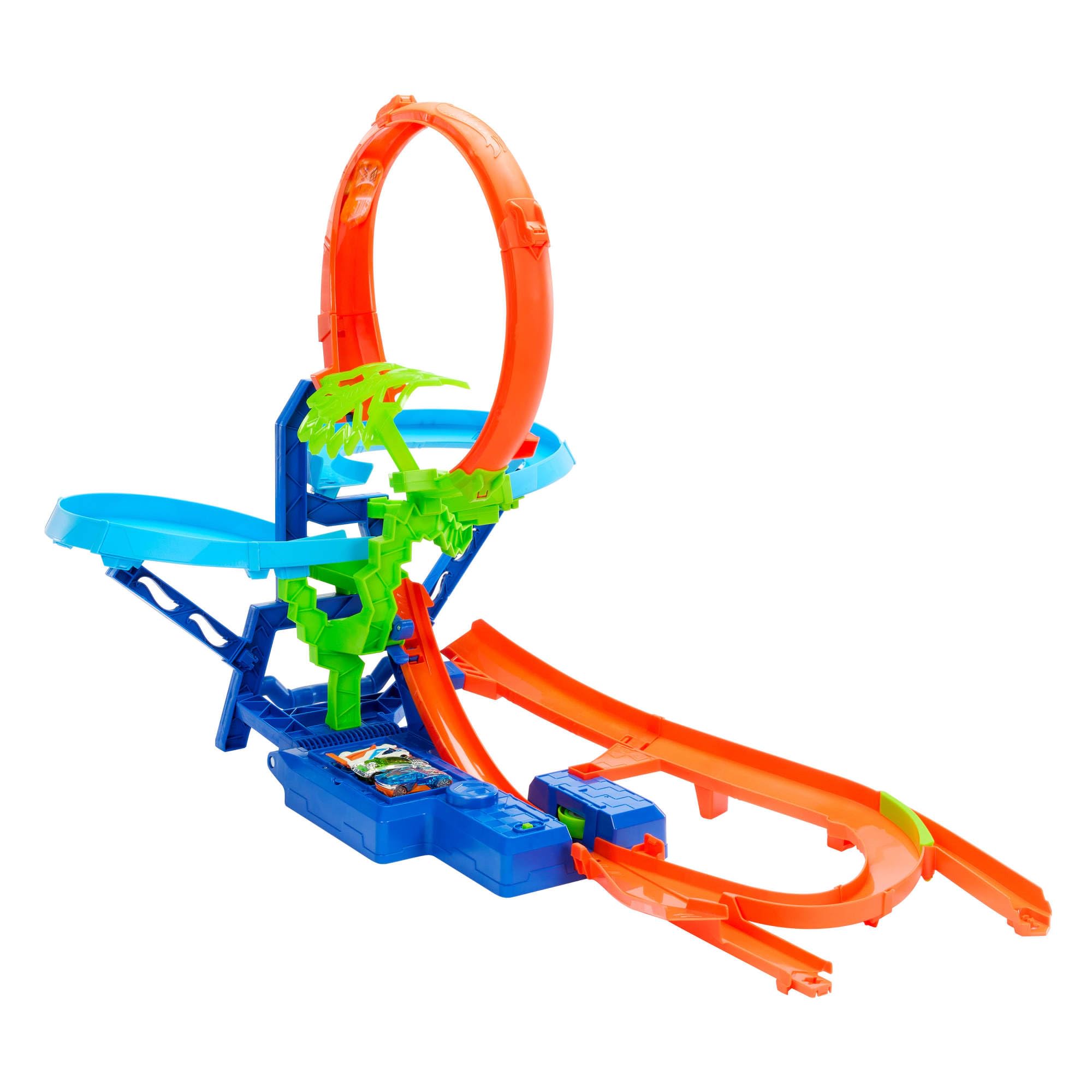 Hot Wheels Conjunto de Pista y Coche de Juguete, Pista de Acrobacias con Choque en el Aire, Incluye un Coche metálico a Escala 1:64 con propulsor motorizado para Correr y Realizar Acrobacias, JFD12