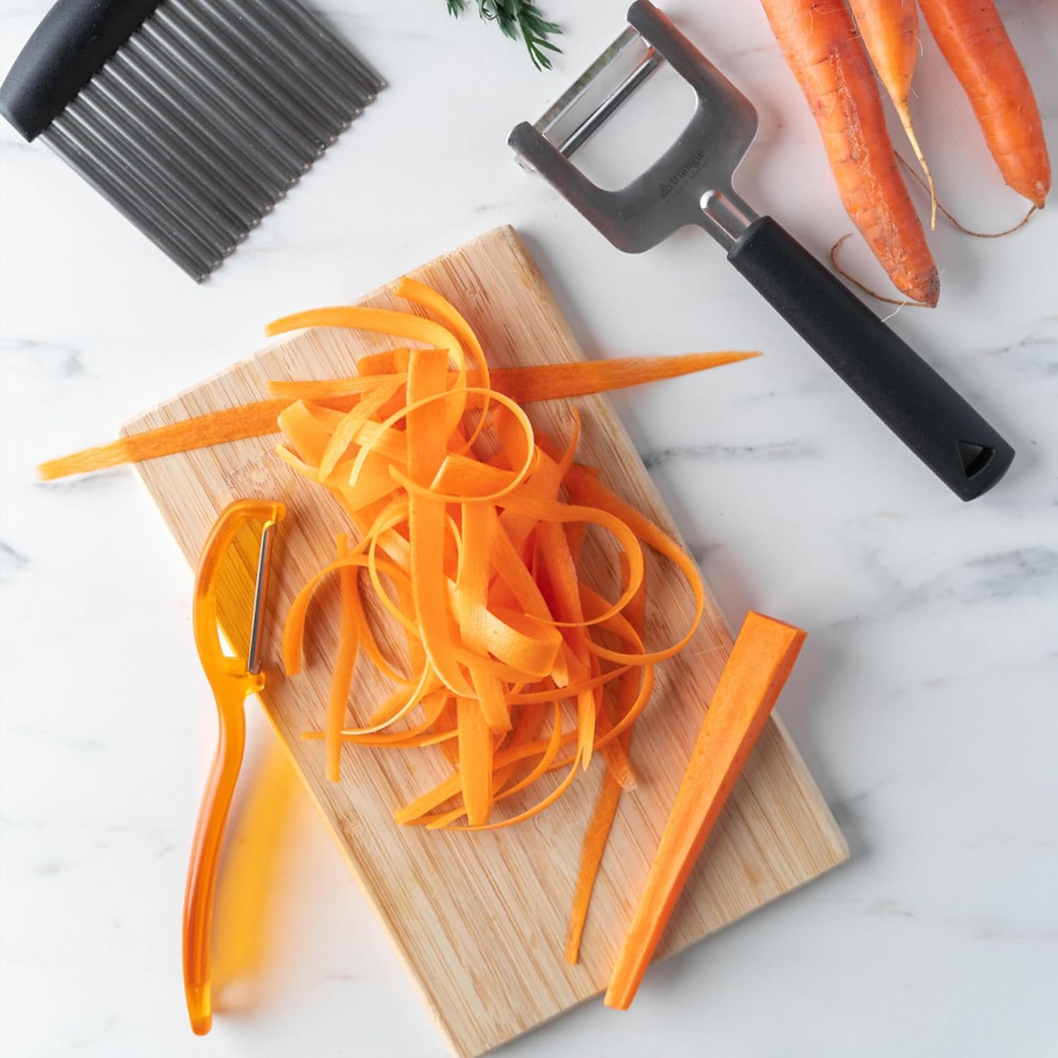 triangle Swivel Peeler, Orange - Stainless Steel Straight Twin Blade - Peels Hard-Skinned Fruits & Vegetables - Lightweight Handle - Dishwasher Safe - Made in Germany
