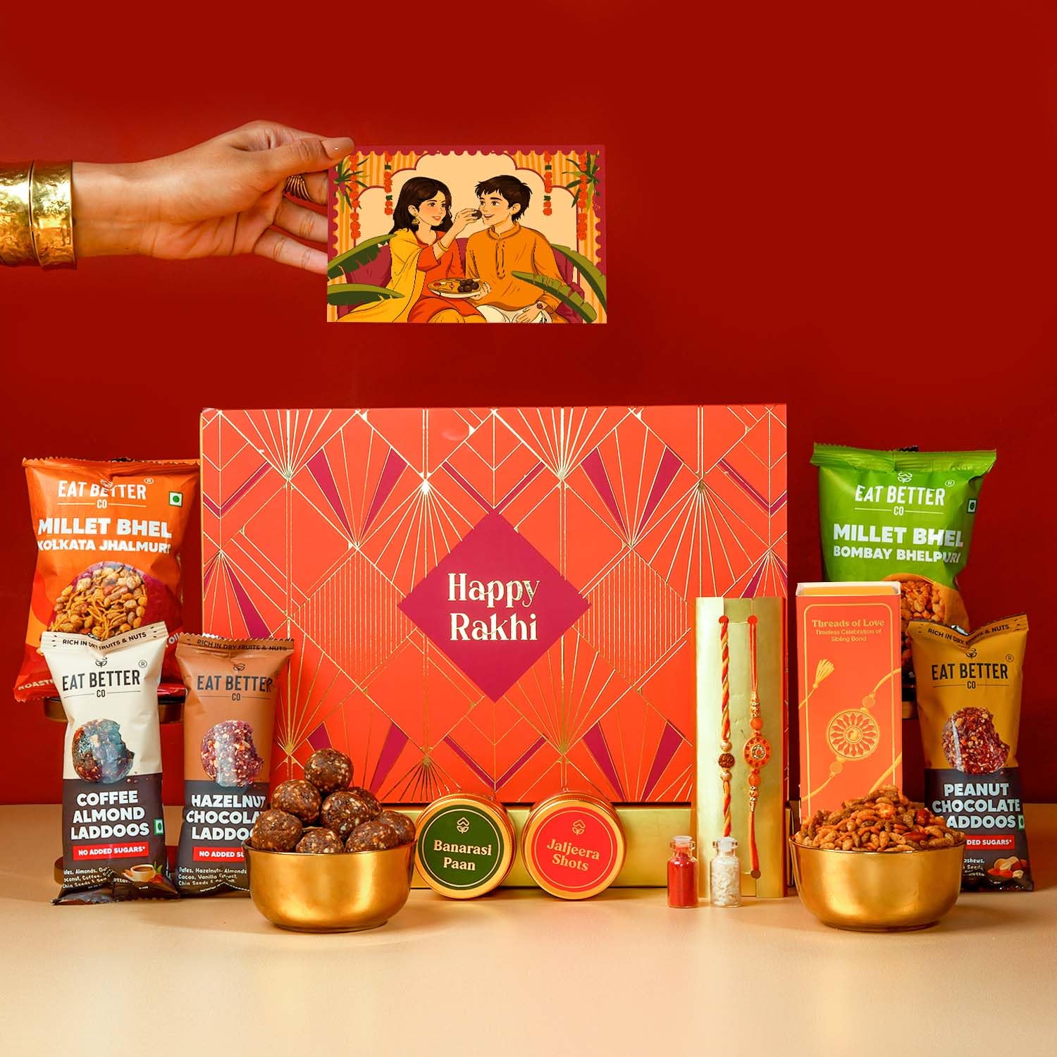 Eat Better Co - Sneh - 11-Item Rakhi Gift Hamper For Brother – Hazelnut, Peanut & Coffee Chocolate Dry-Fruit Laddoos, Millet Bhel, Set of 2 Premium Rakhi | Rakhi for Brother with Gift Combo Set-image-7