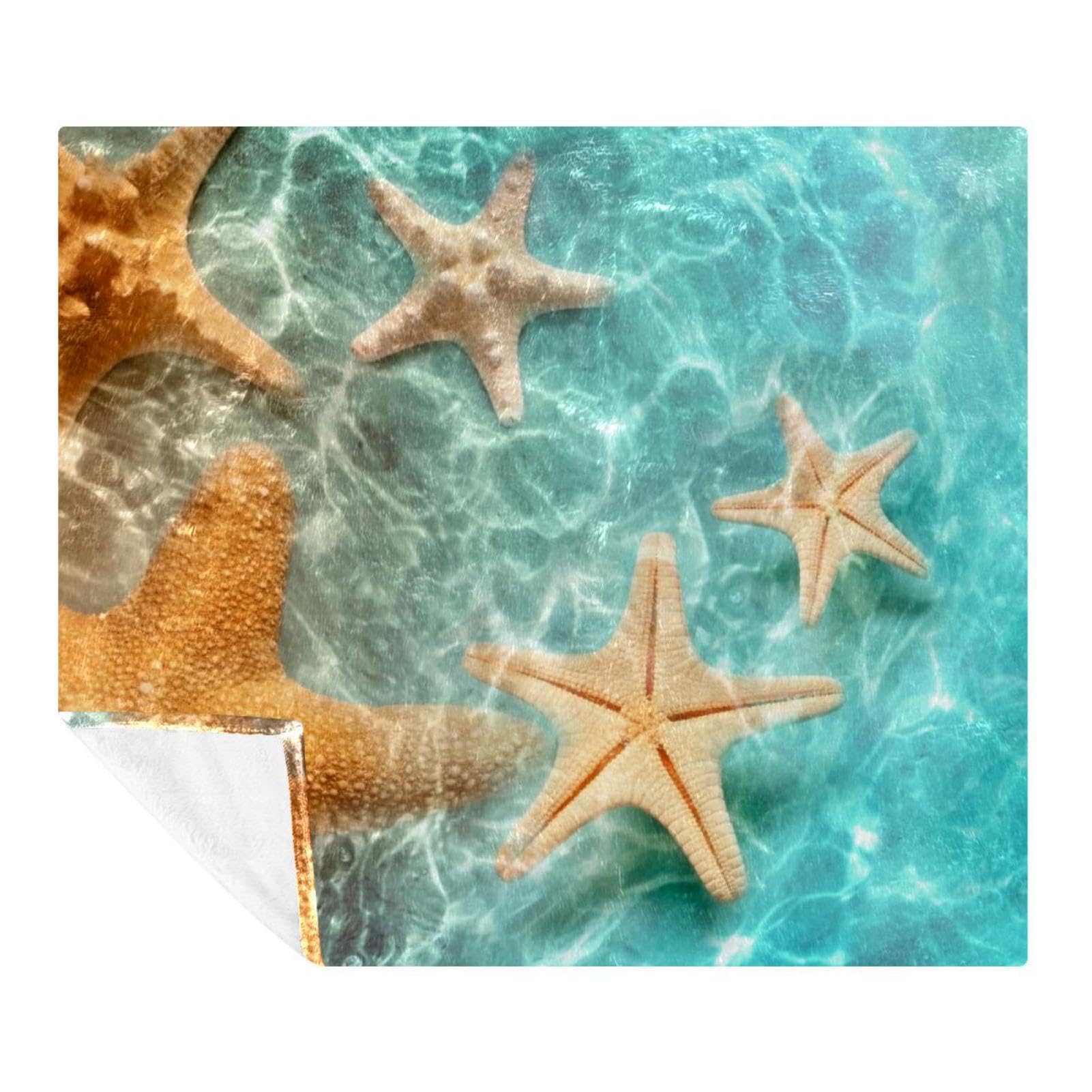 Couverture microfibre polaire étoile de mer pour vos soirées canapé et voyage en famille