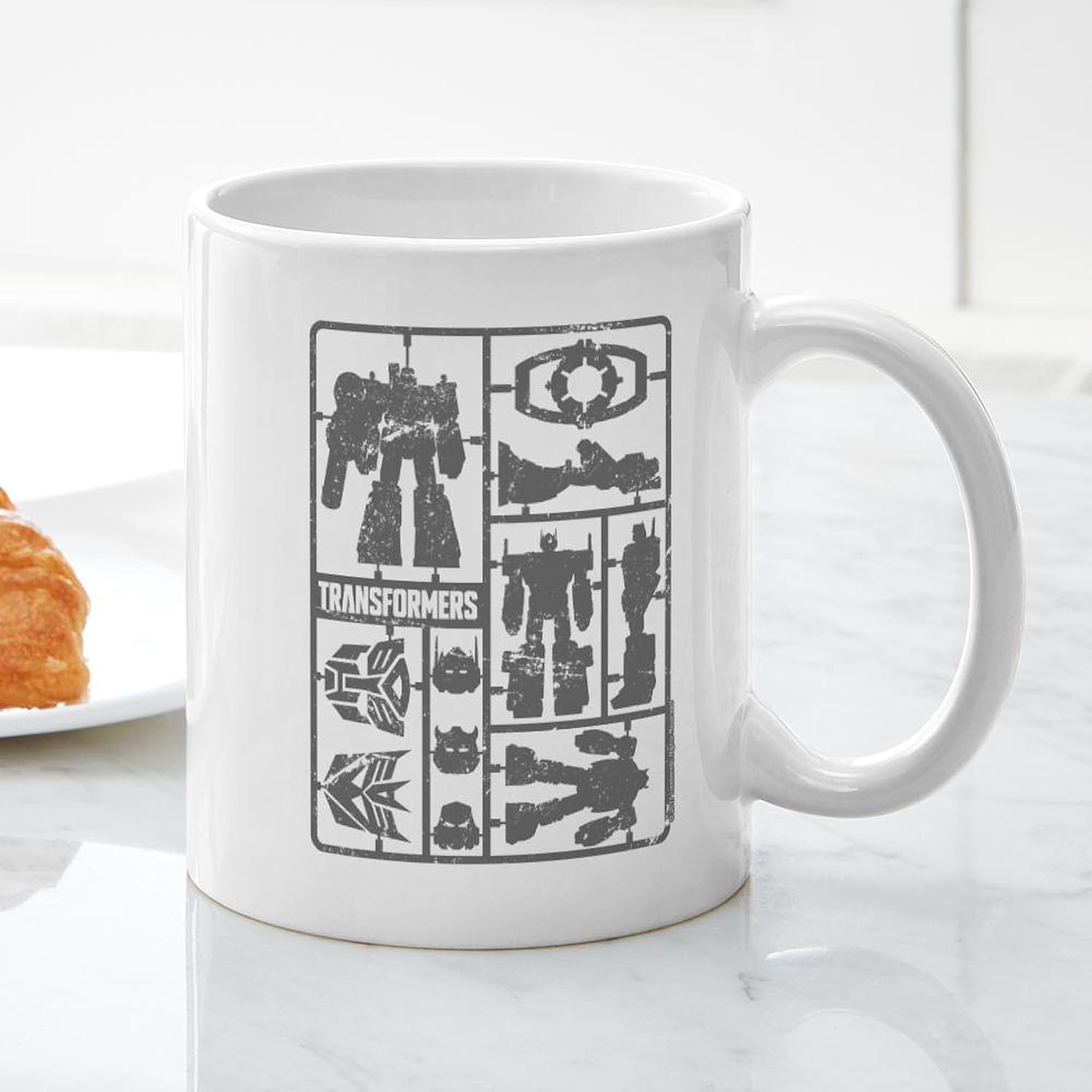 CafePress Transformers Pieces 11 oz (325 ml) Ceramic Coffee Mug