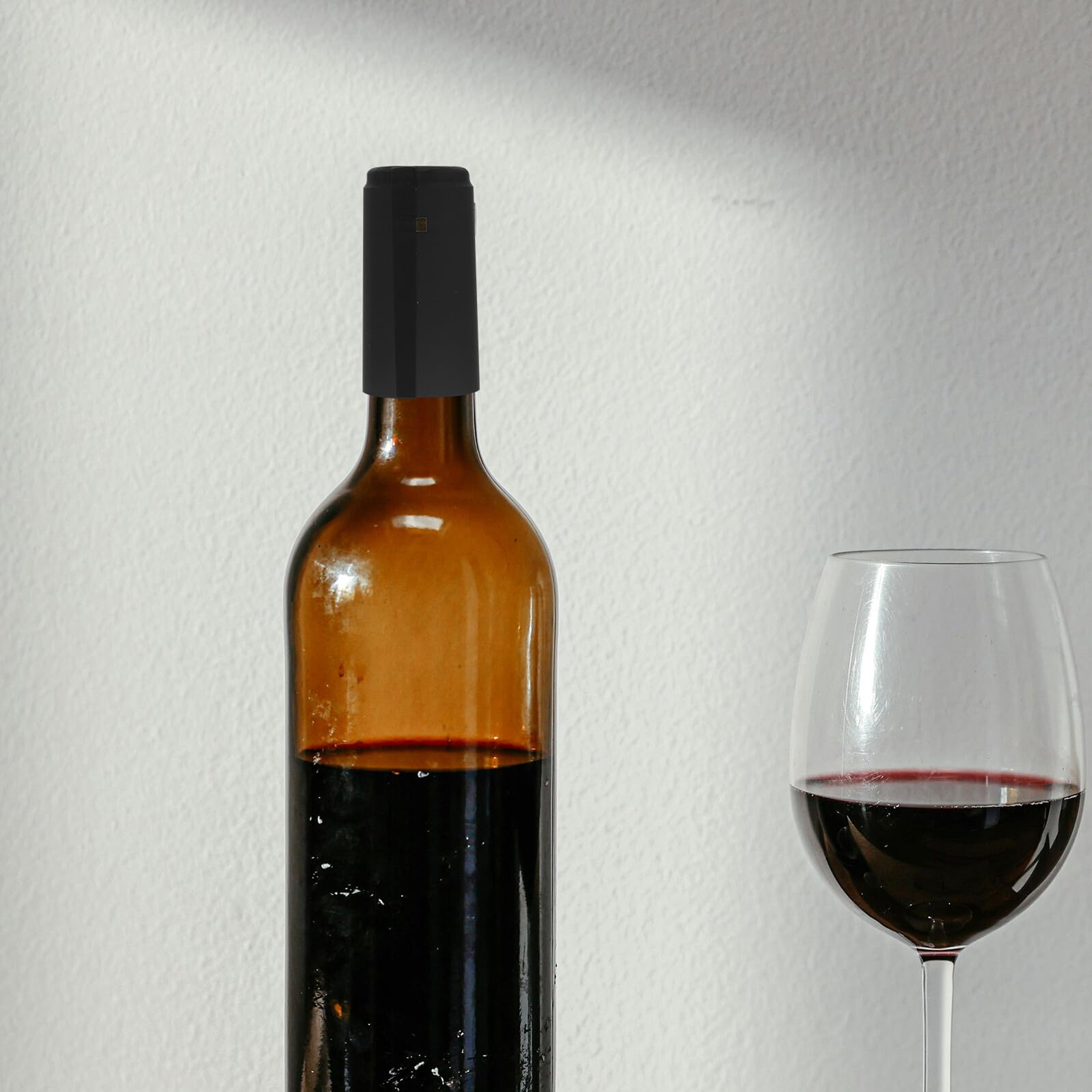 100 Piezas Cápsulas Termorretráctiles de PVC para Sellado de Botellas de Vino Fáciles de Aplicar con Calor para Uso Doméstico Protección Duradera y Envoltura