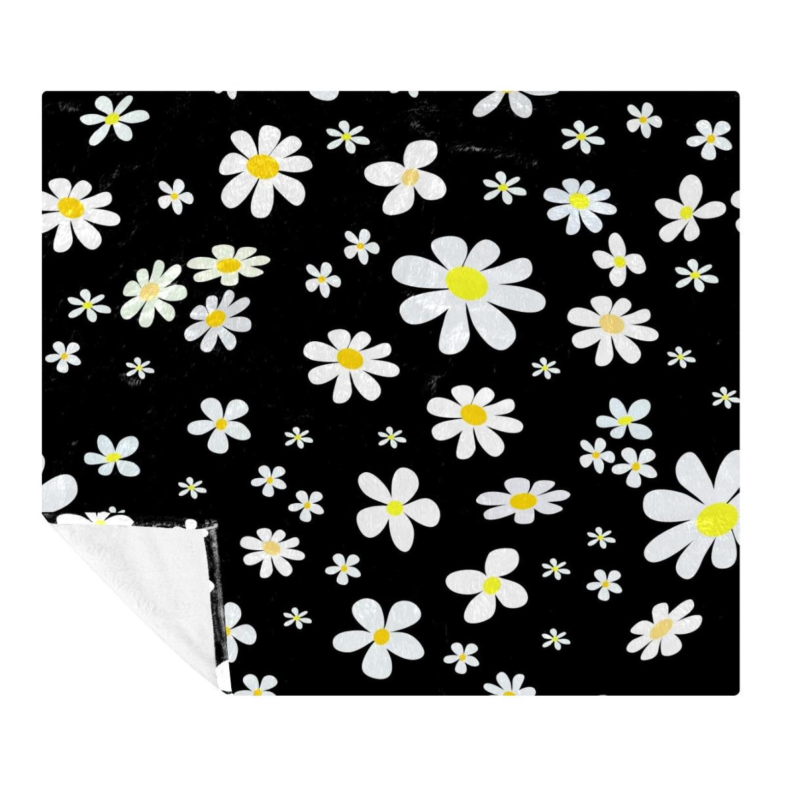 Couverture polaire légère à motif marguerites pour vos soirées canapé