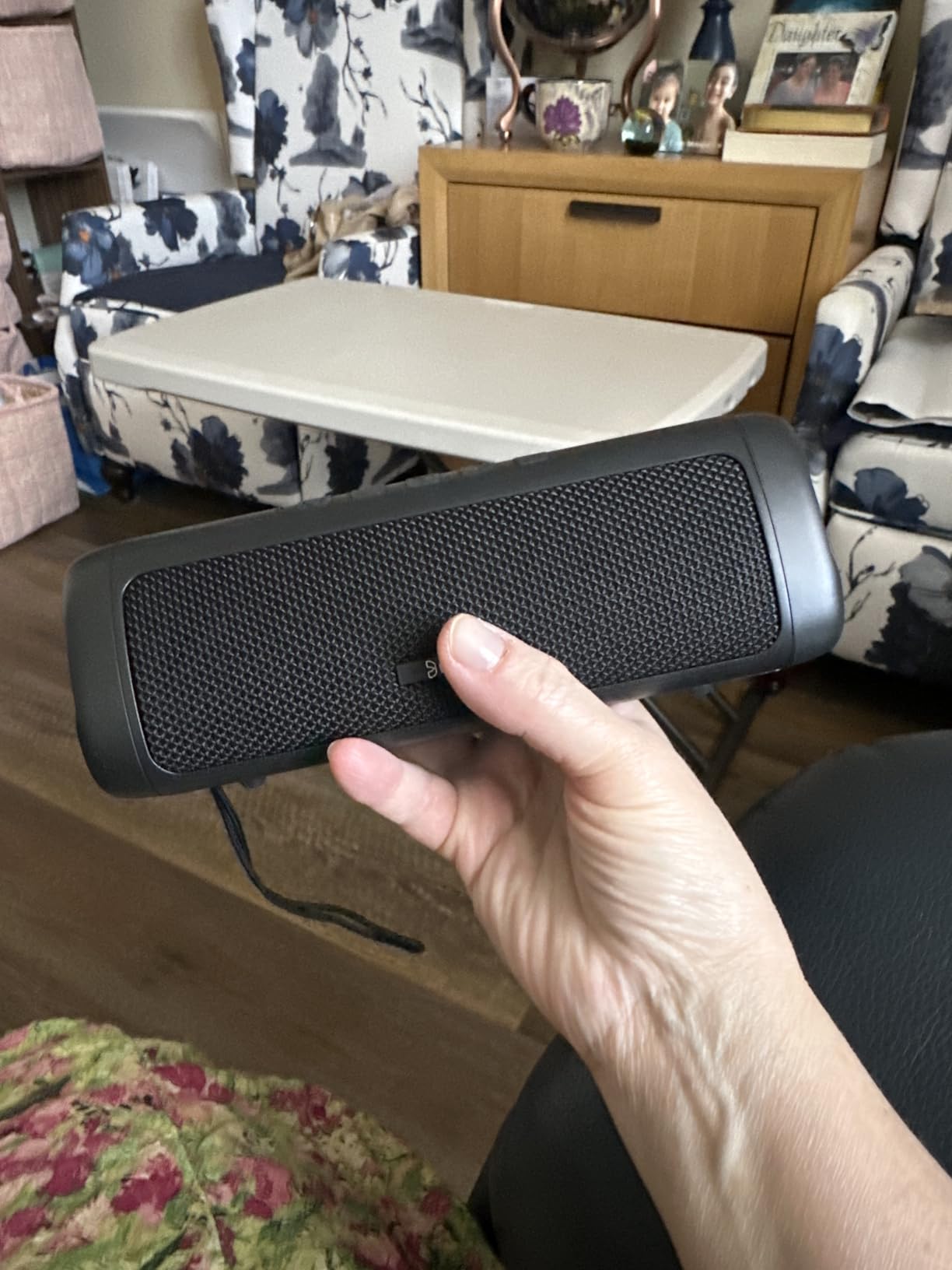 Holding the BolaButty speaker in hand