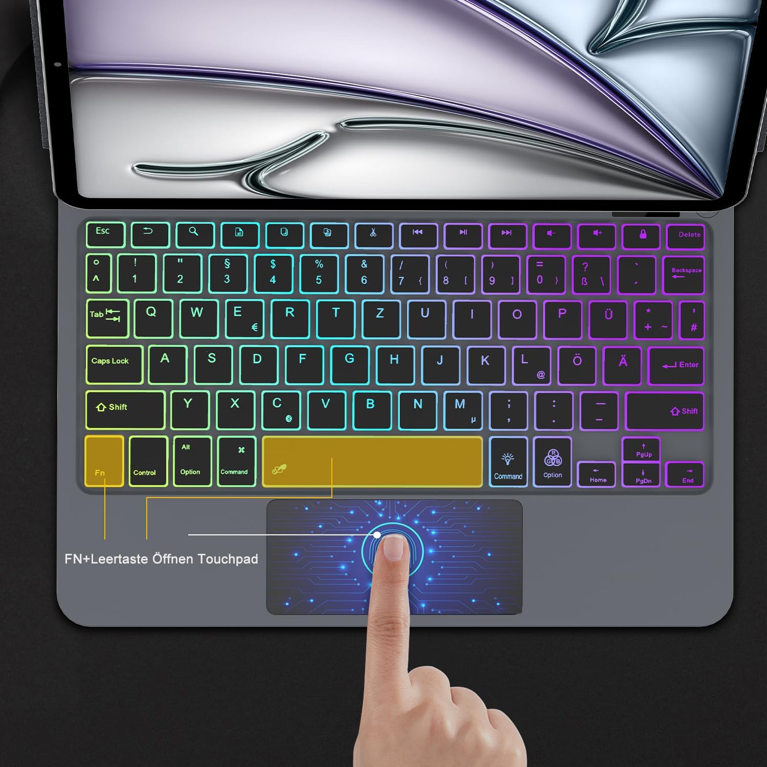 Close-up of the QWERTZ keyboard layout showing the trackpad and the Fn+Space key combination for enabling/disabling the trackpad.