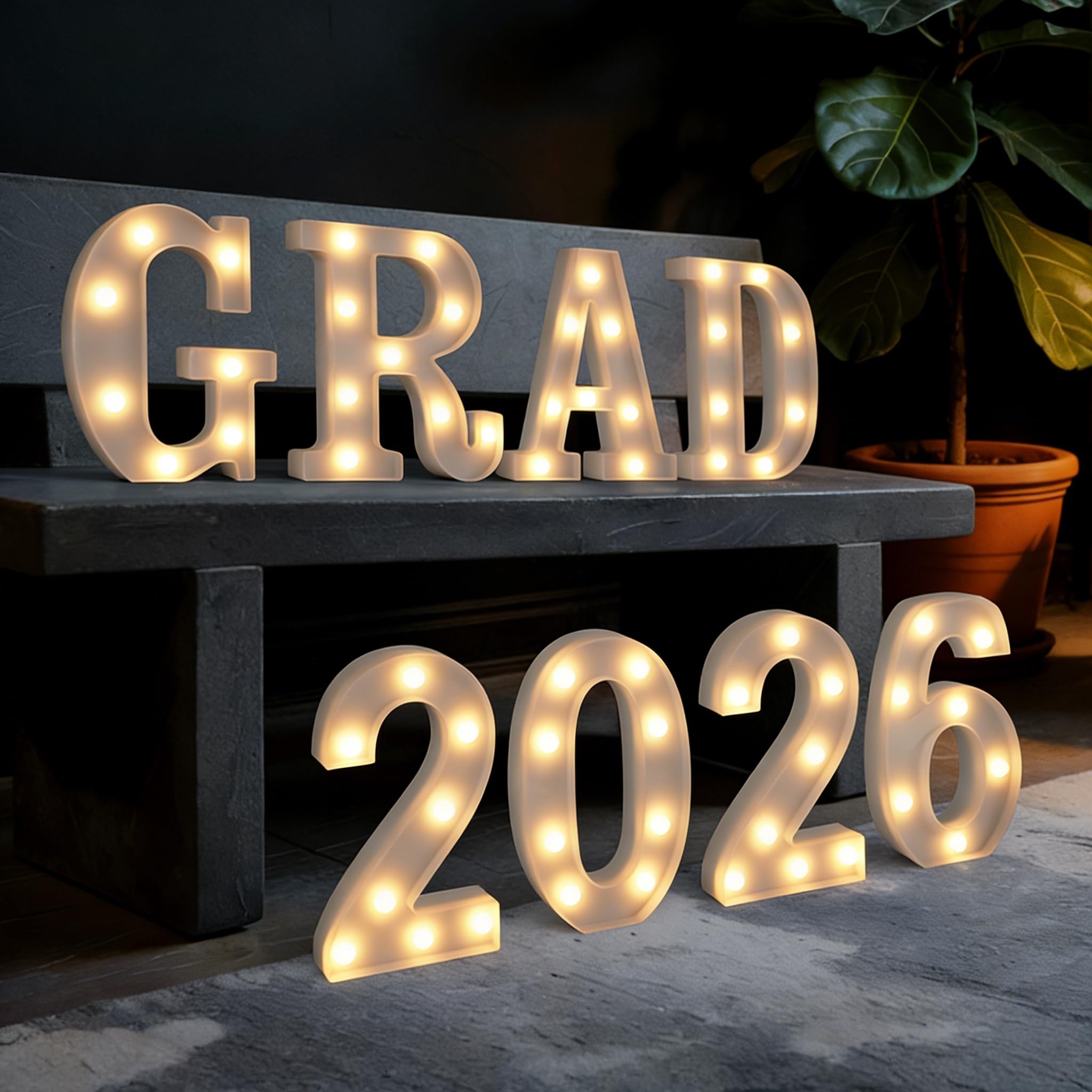 Photo 1 of Marquee Letters Numbers Light up Numbers Letters Graduation Decoration GRAD 2026 Battery Powered LED Light White Plastic Letter Number Sign for Class of 2026 Graduation Decorations