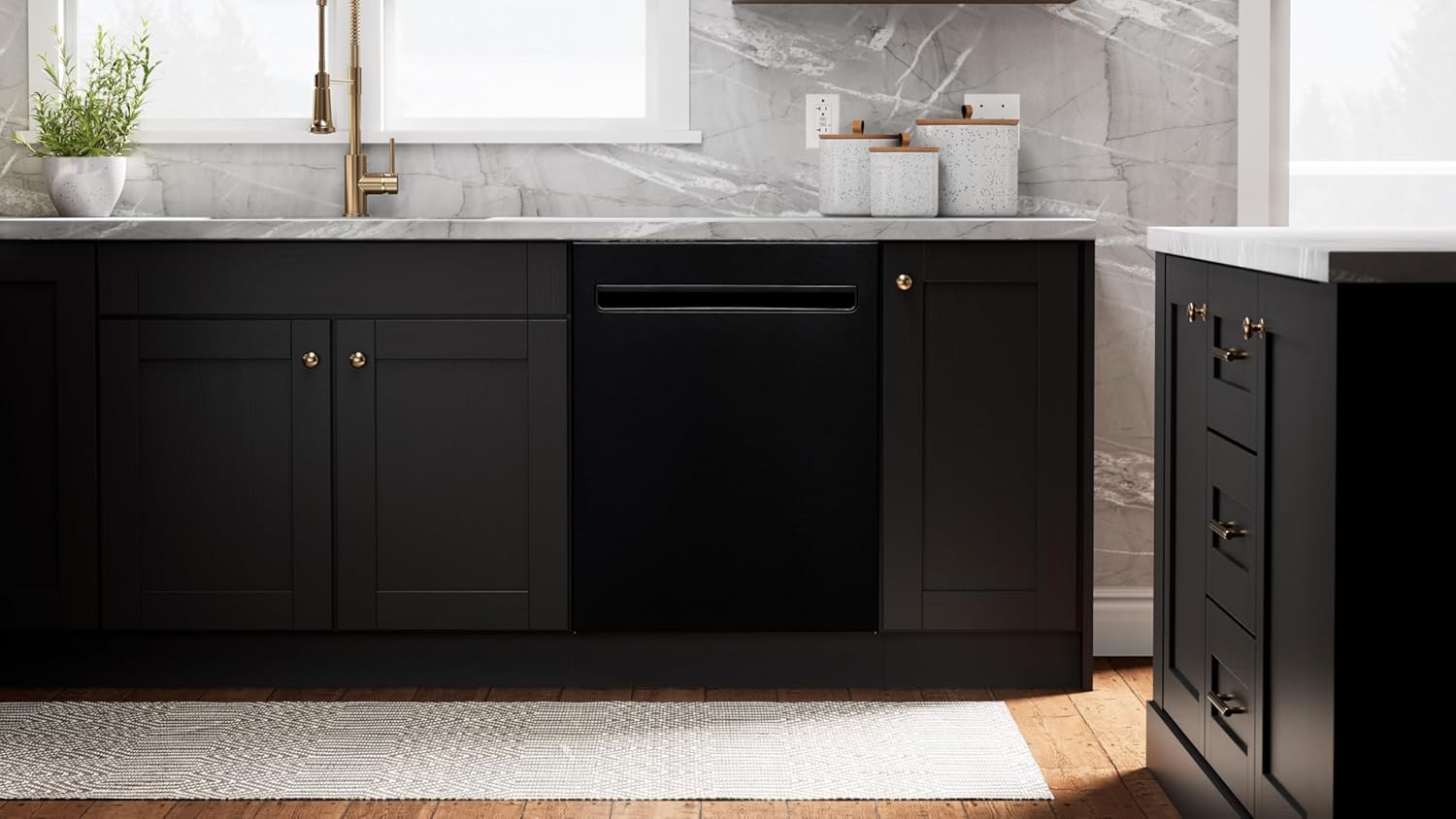 Kenmore Elite dishwasher installed under a kitchen counter.