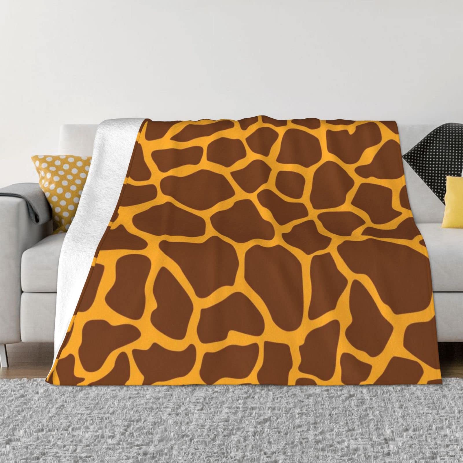 Couverture polaire légère girafe pour cocooning sur canapé et salon toutes saisons