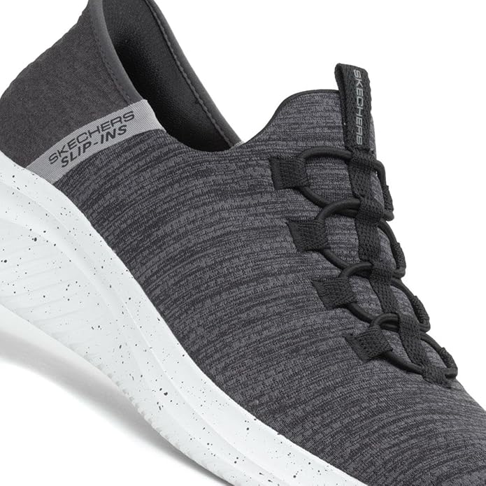 With a sporty and casual look, the Skechers Men's Ultra Flex 3.0 Right Away Hands Free Slip-in Sneaker Loafer is a versatile choice that can easily transition from day to night. Whether you're running errands, going for a casual stroll, or meeting up with friends, these slip-on loafers offer both style and convenience. Description by ChatGPT.