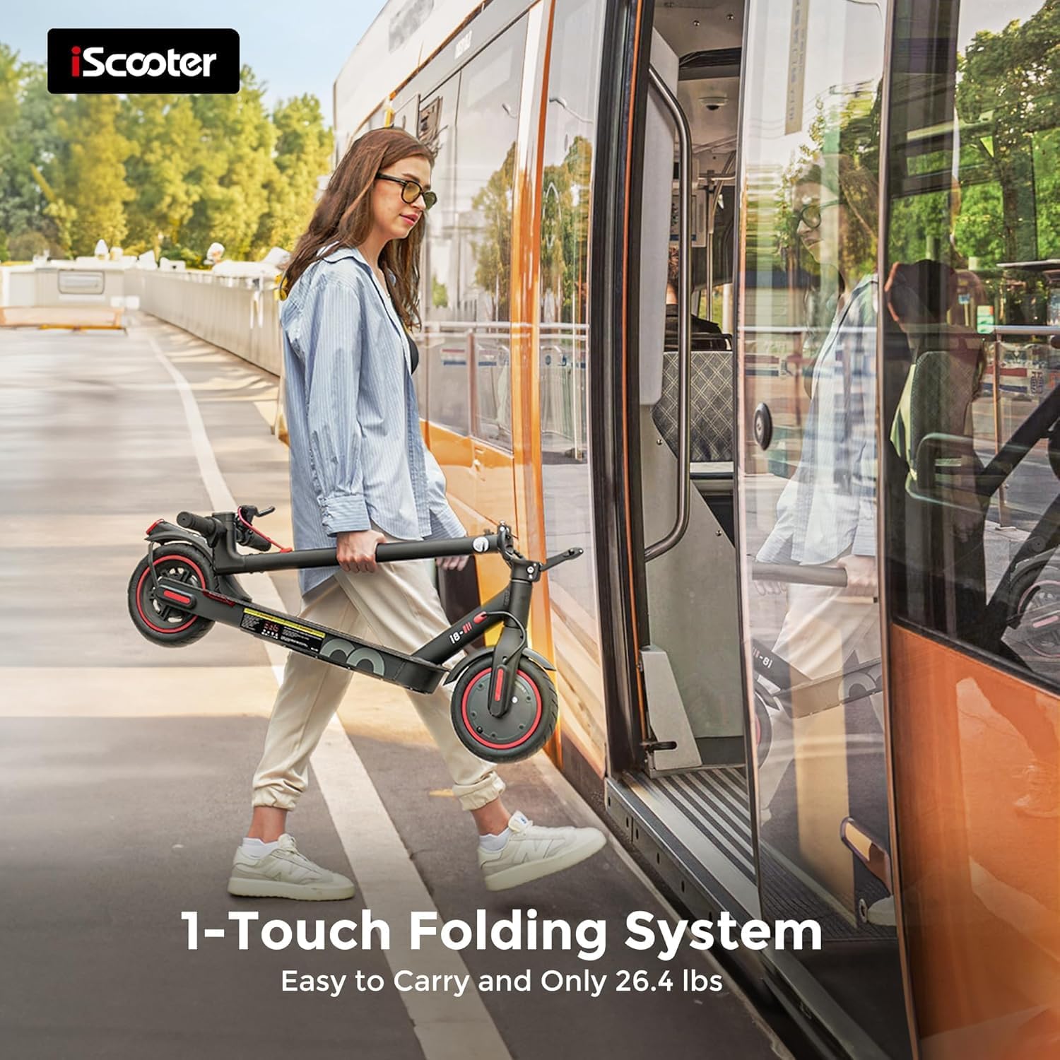 iScooter i8 Electric Scooter being folded and carried