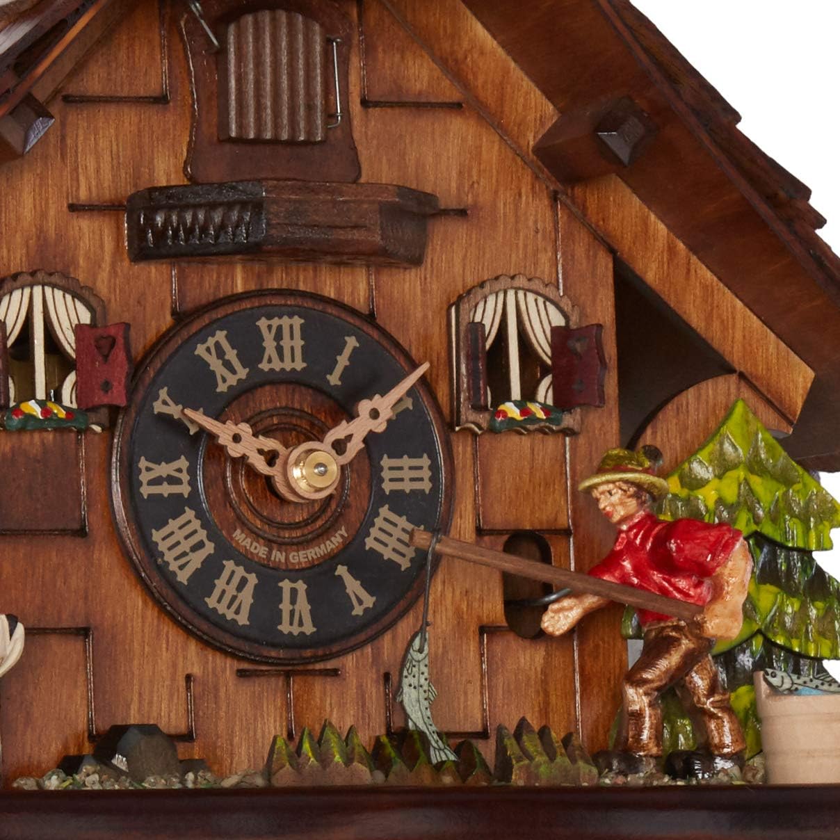 One Day Cuckoo Clock Cottage, Fisherman Raises Fishing Pole