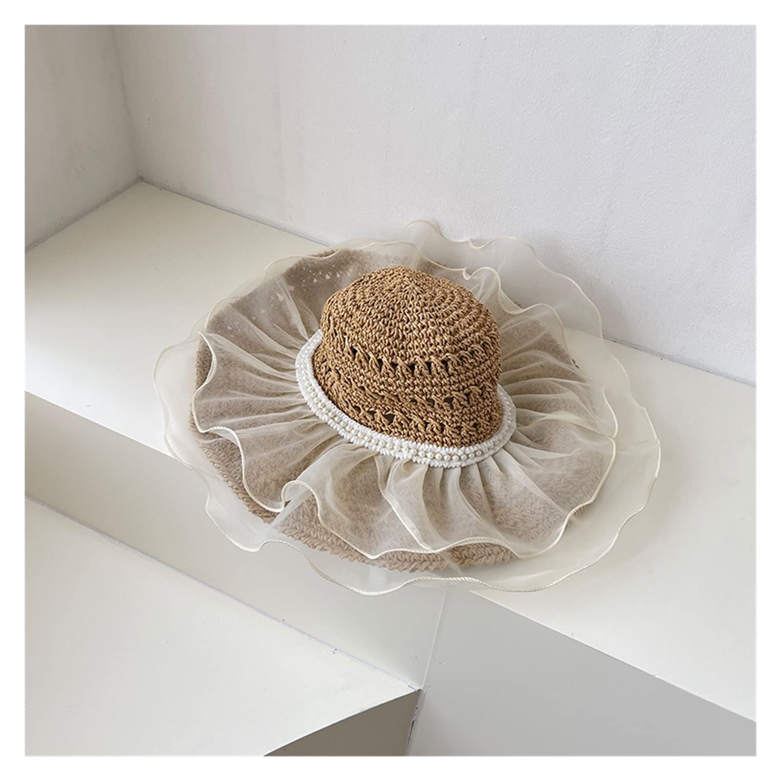 Chapeau de seau en paille pour la plage et le bord de mer
