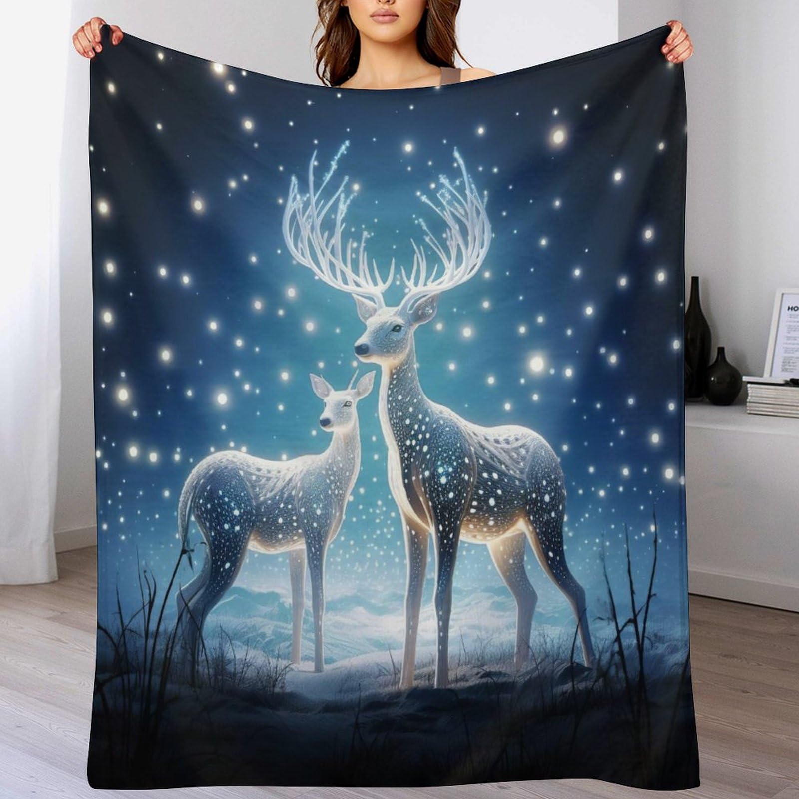 Couverture polaire cerf pour soirée cocooning sur le canapé du salon