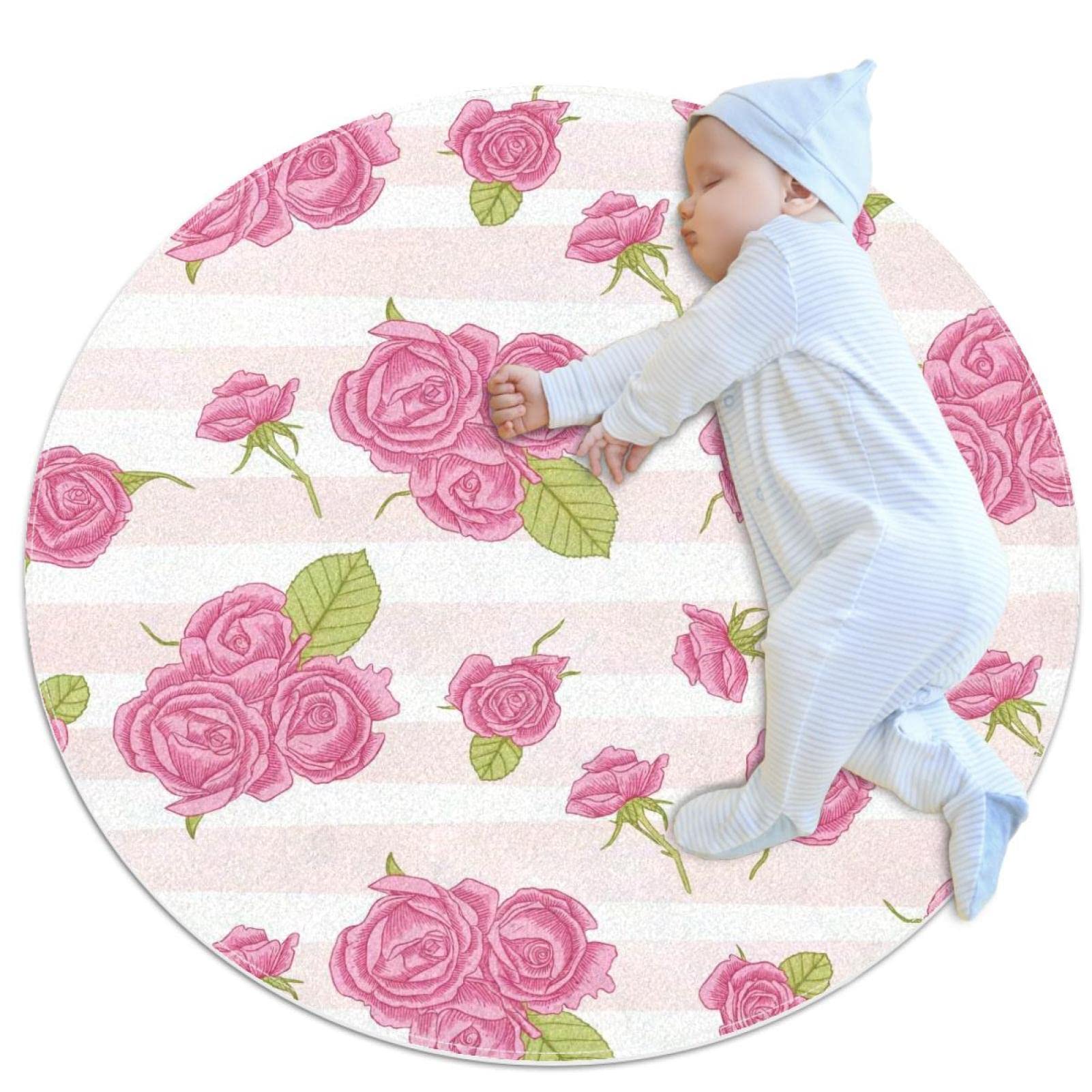 Tapis rond antidérapant pour sécuriser le sol de la chambre avec de belles roses roses