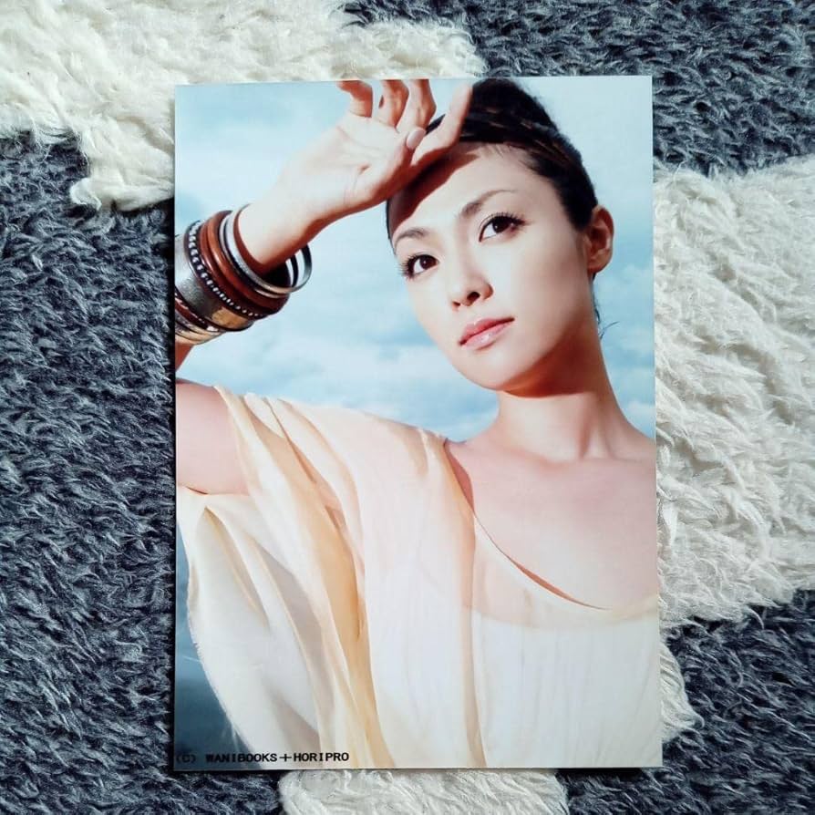 EXOTIQUE : 深田恭子写真集 Amazon.co.jp: 深田恭子写真集 『 EXOTIQUE 』 : レスリー・キー: 本
