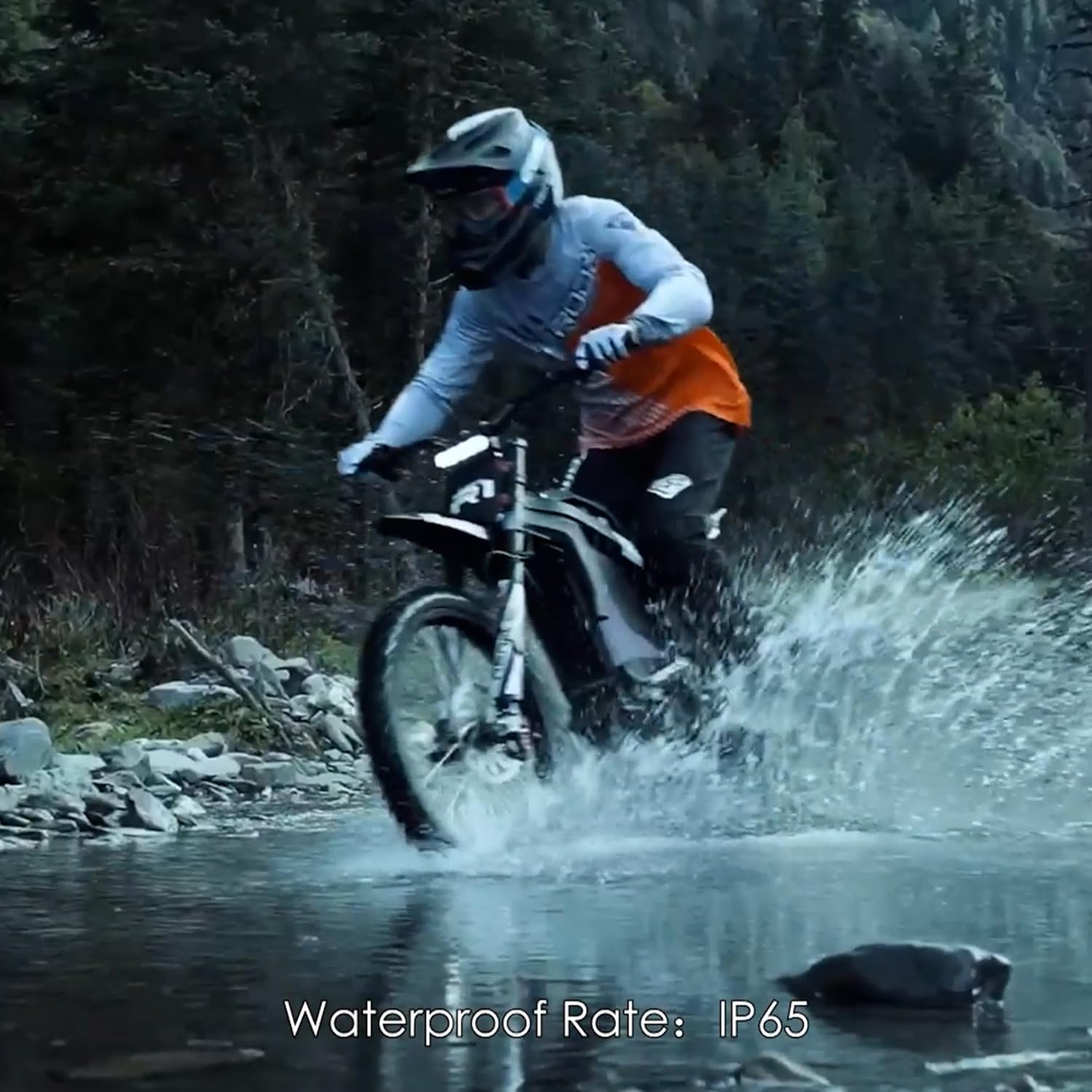HEZZO R1 Electric Dirt Bike rider in water, demonstrating IP65 waterproof rating