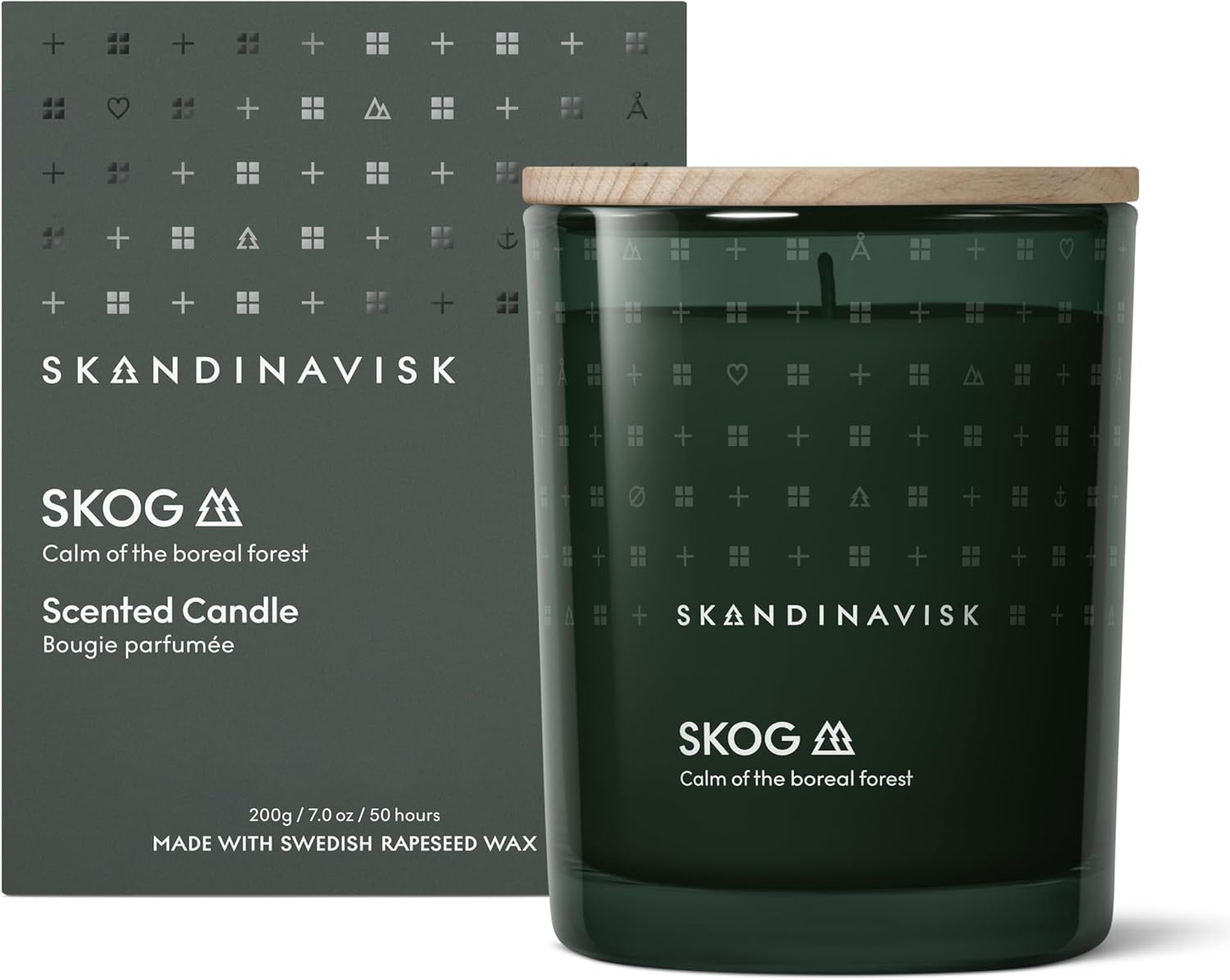 Skandinavisk Skog 'Forest' Scented Candle. Fragrance Notes: Pine Needles and Fir Cones, Birch Sap and Lily of The Valley. 7.0 oz.