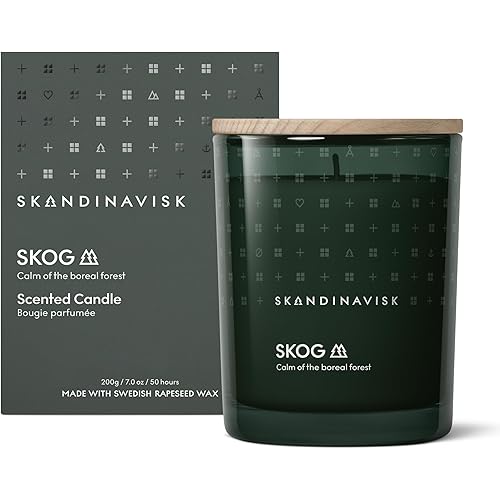 Skandinavisk Skog 'Forest' Scented Candle. Fragrance Notes: Pine Needles and Fir Cones, Birch Sap and Lily of The Valley. 7.0 oz.
