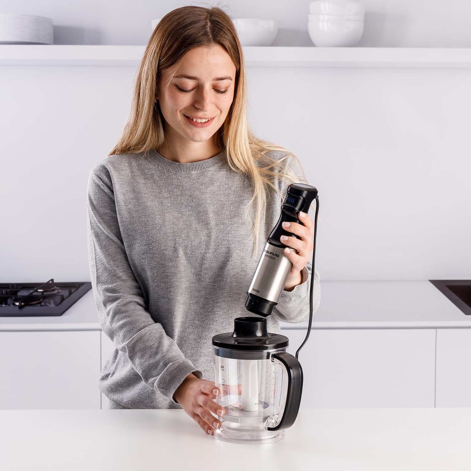 Taurus - Batidora de mano | 1500W Potencia | Regulador de 20 velocidades ajustable | Función Turbo | Cuchillas de acero inoxidable | Pica hielo | Diseño ergonómico | Vaso medidor 700 ml | Inox