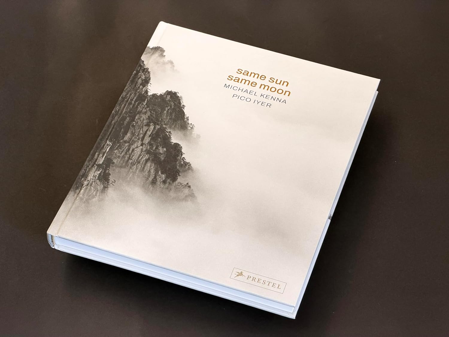 Same Sun Same Moon      Hardcover – April 14, 2026