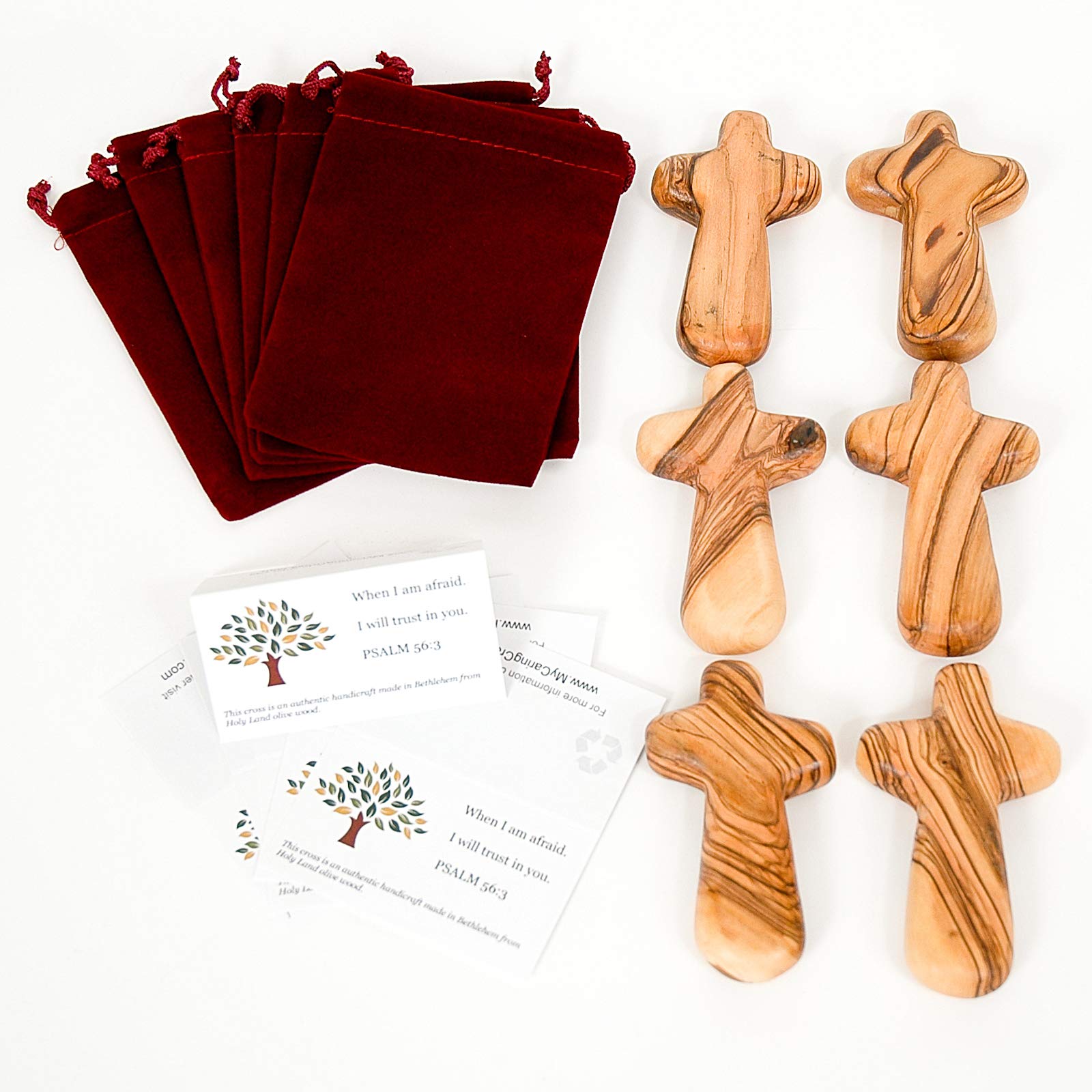 Cruces de madera de olivo para regalar en ocasiones especiales con bolsa