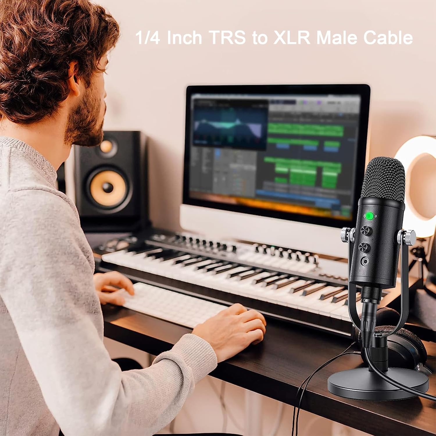Person using a microphone connected with a 1/4 inch TRS to XLR male cable in a studio setting