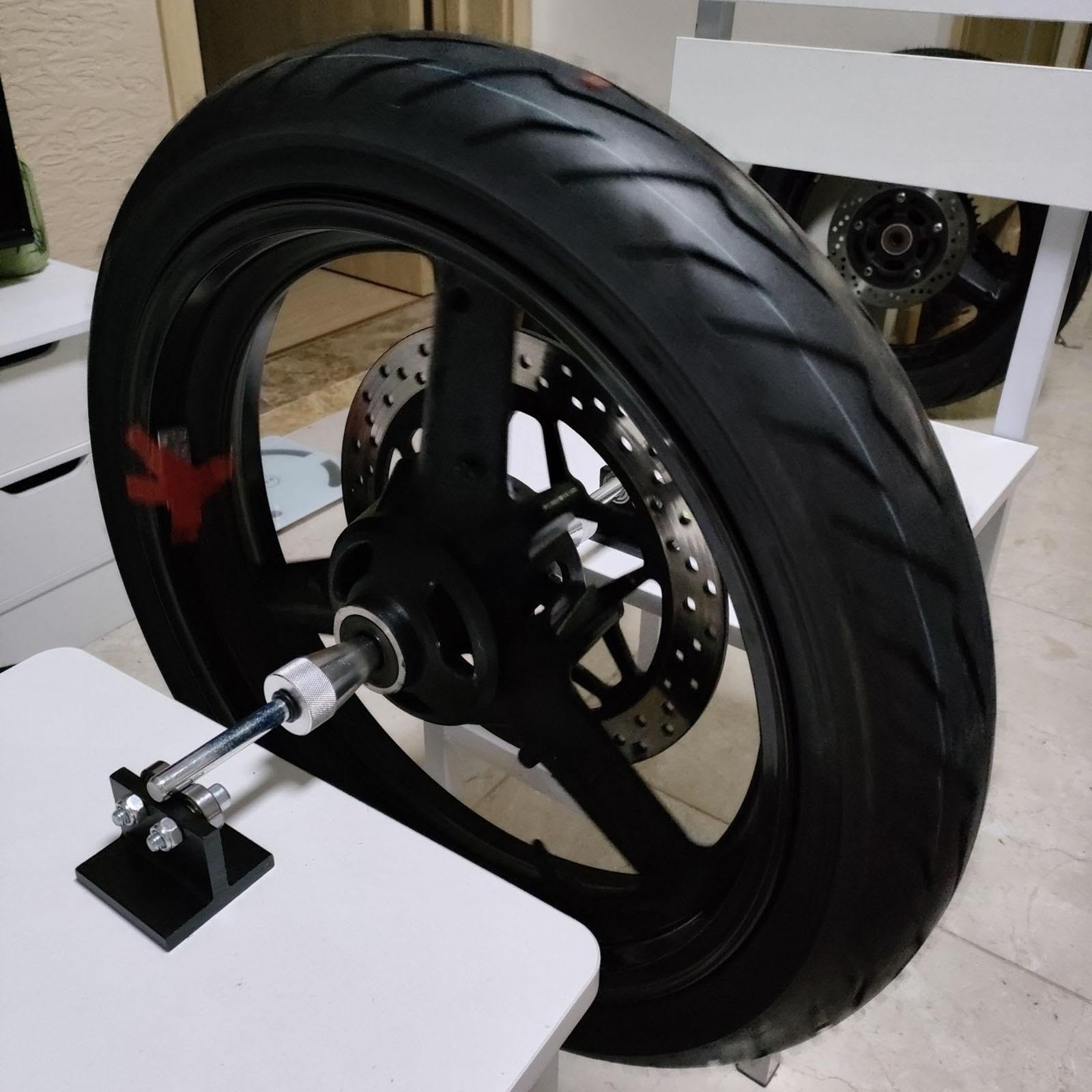 Equilibrador de ruedas portátil para motocicletas de aleación de aluminio, fácil de optimizar para mayor velocidad y precisión en el balanceo.