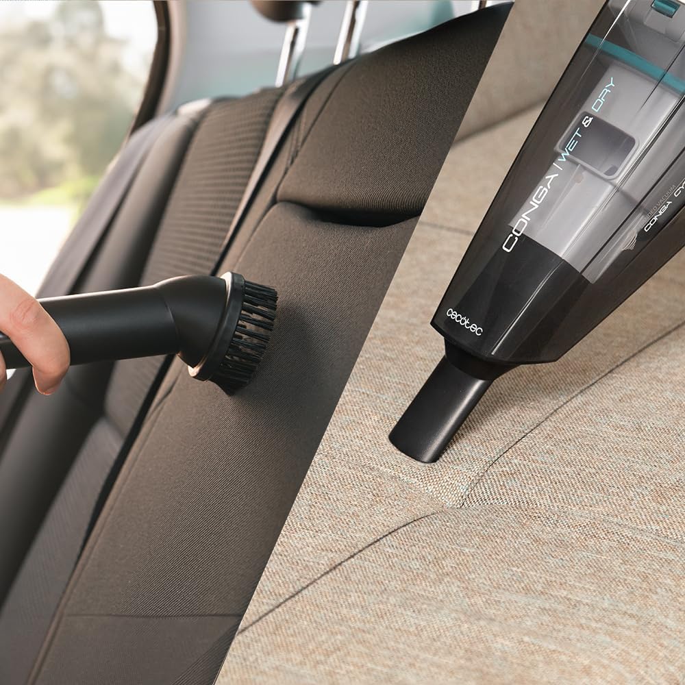 Cecotec Conga Rockstar vacuum cleaner being used to clean a car interior