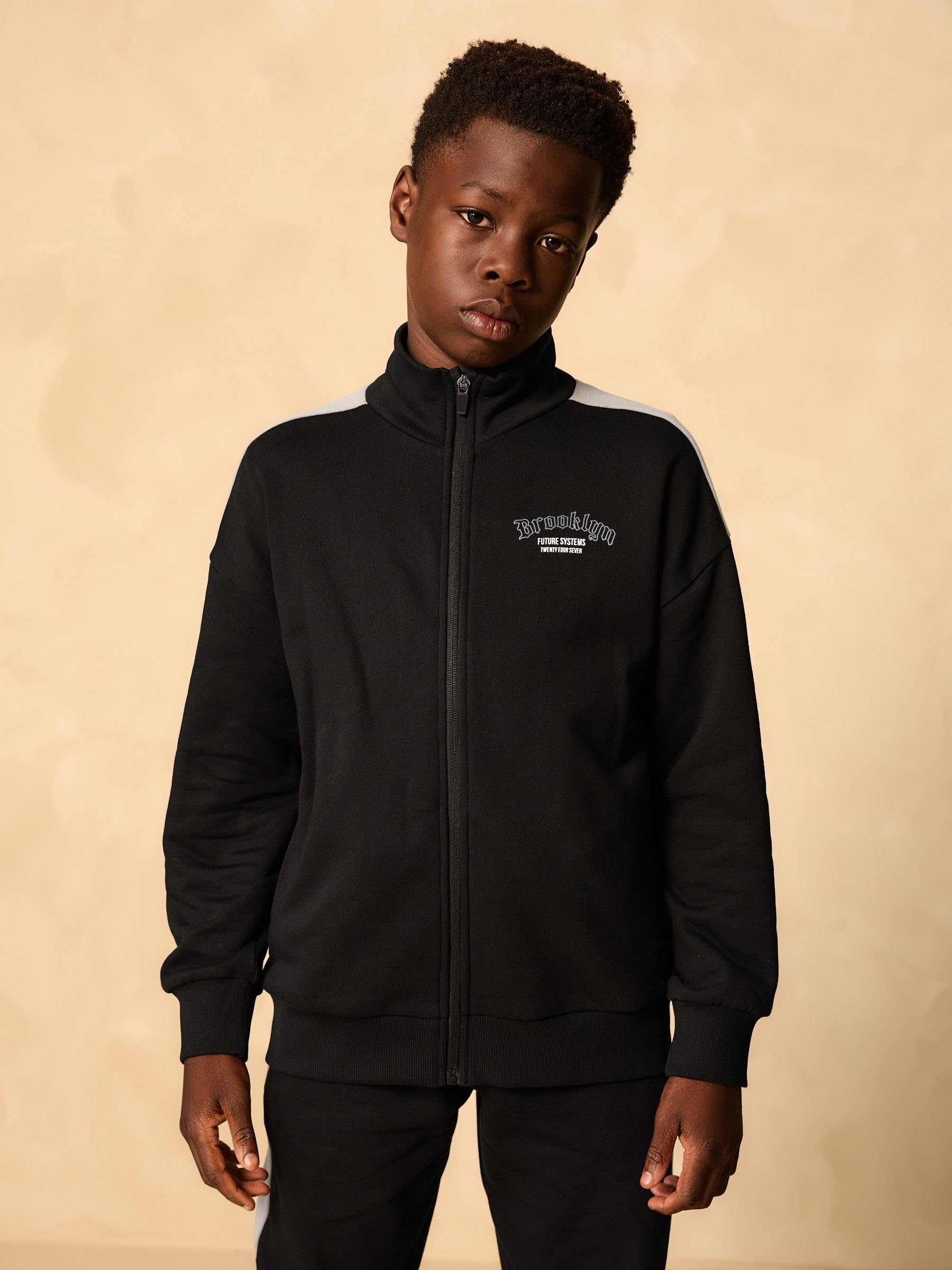 NEXT Niños Conjunto de sudadera con cremallera y cuello alzado y pantalones de chándal