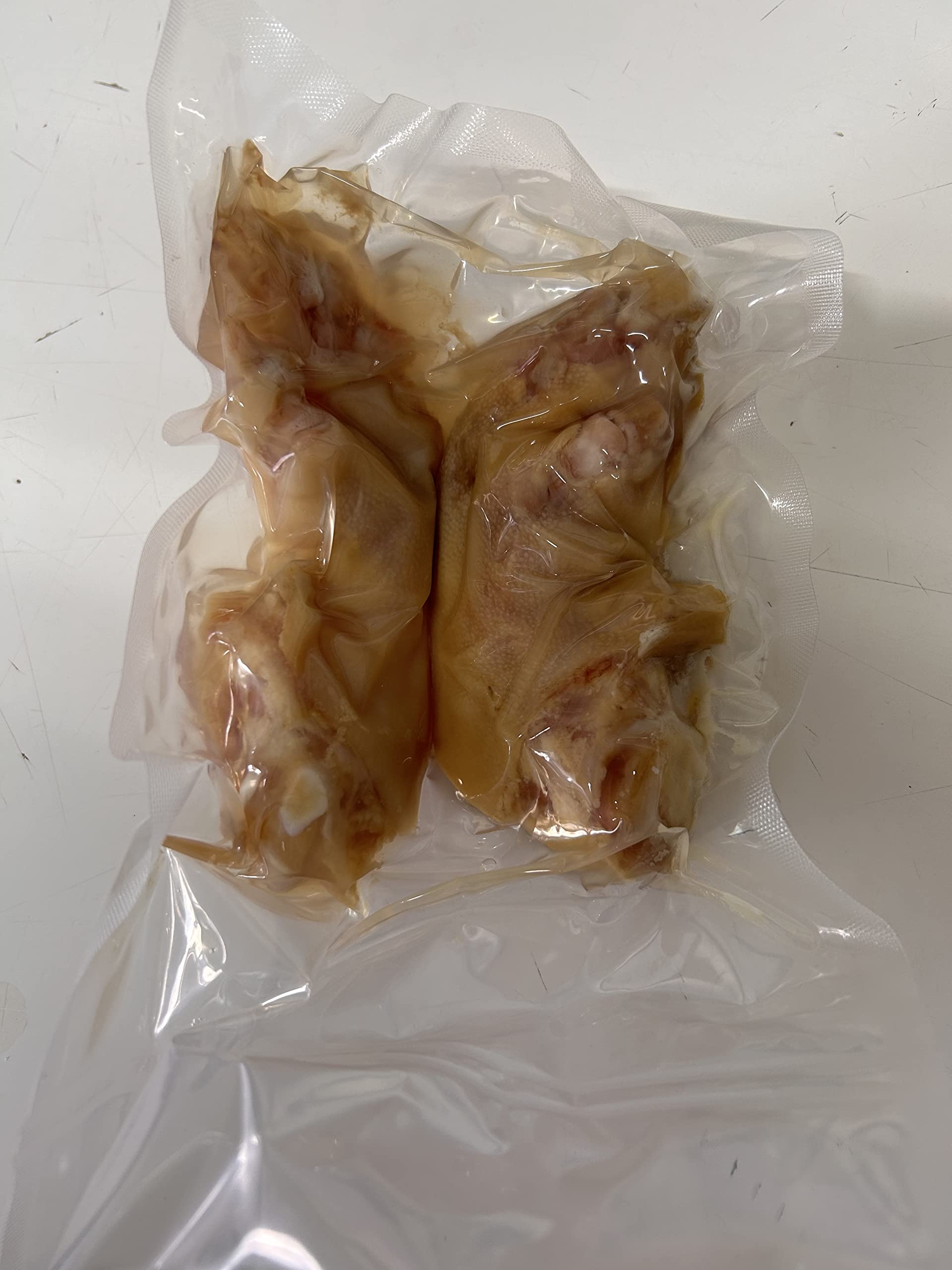Manitas de cerdo cocidas en su jugo 12 piezas
