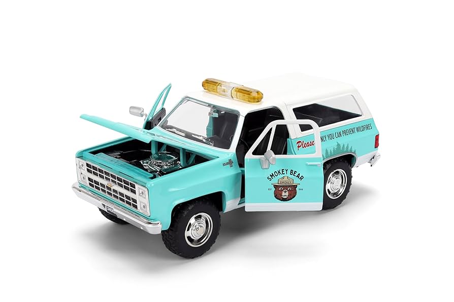 JADA 1980 シボレーブレーザー & スモーキーベアー・フィギア Amazon.com: Jada Smokey Bear 1980 Chevy Blazer Die-Cast Car