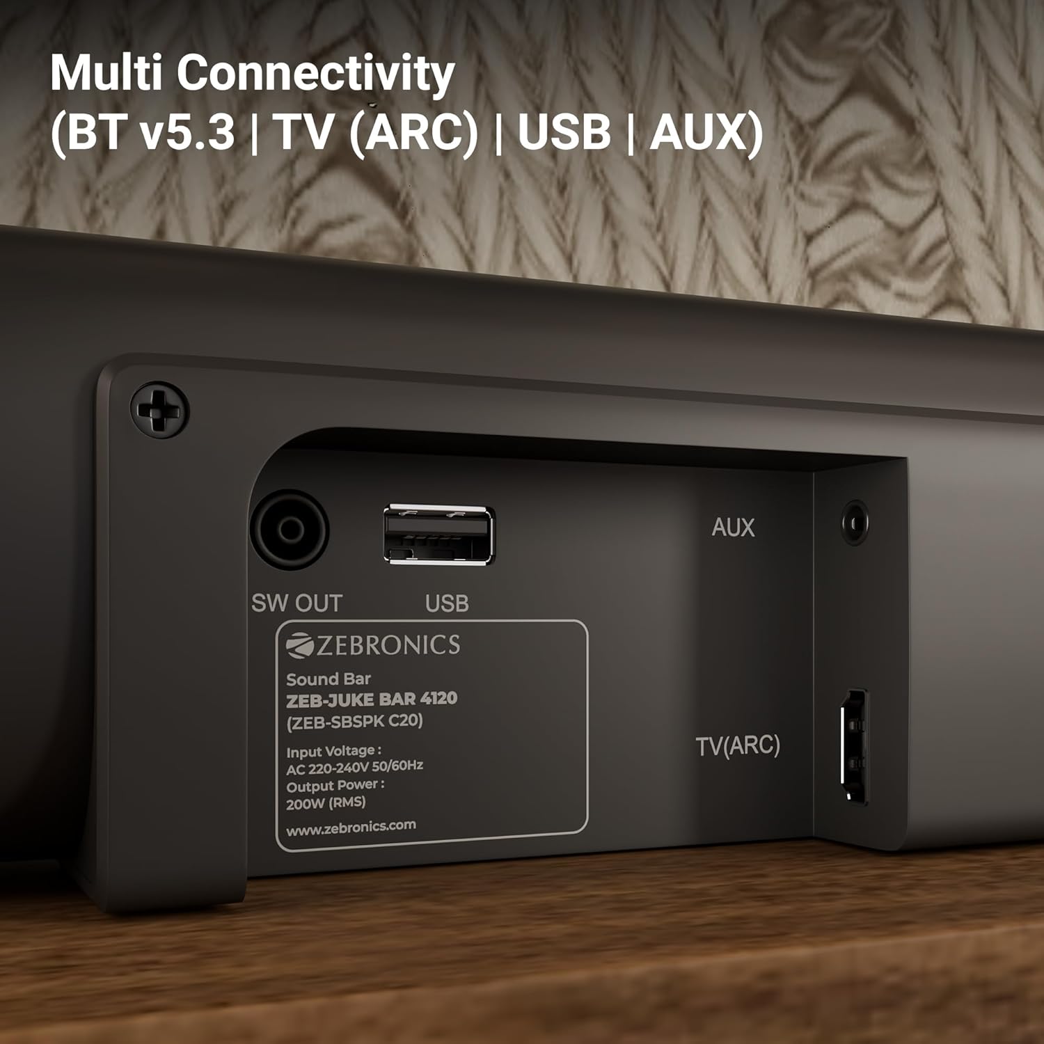 Soundbar wall-mounted below a television