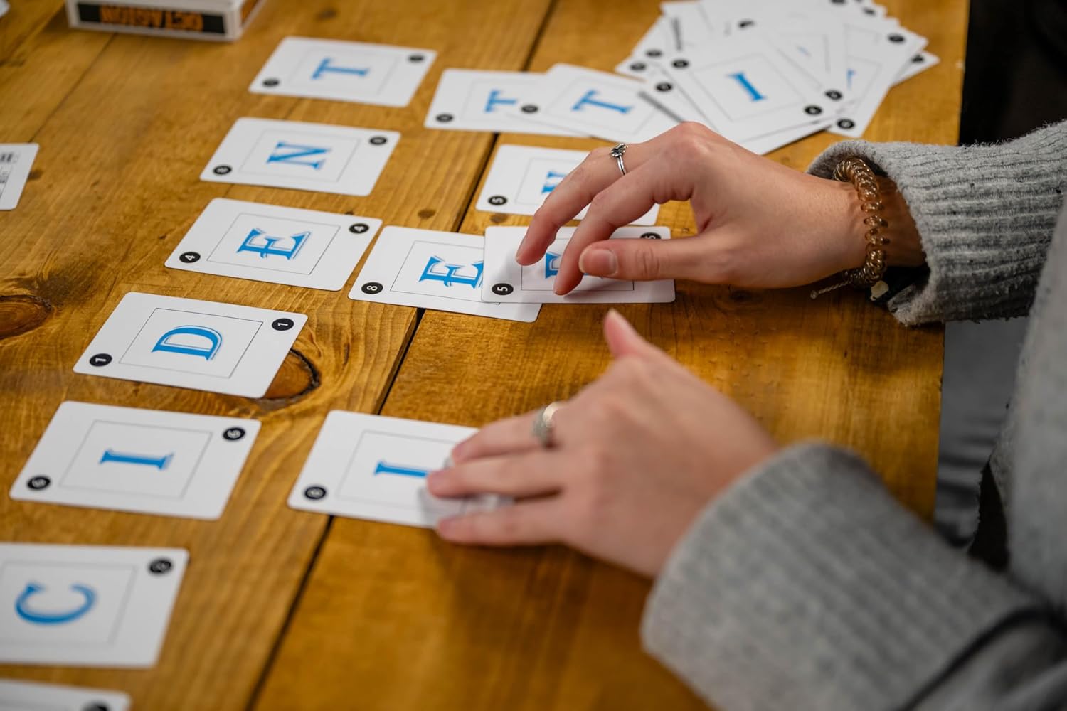 Octagion | Clever Word Card Game Based on Deduction & Pattern Recognition | Play Solo, Head-to-Head or Teams | Family-Friendly Speed-Spelling Game | Easy to Learn, Intense to Master