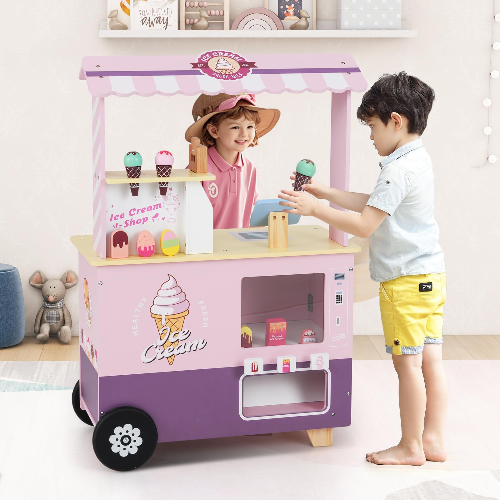 HOMASIS Kinder Eiswagen Holz mit 15 Zubehör, Kaufladen mit 6 Spielzeug-Eiscreme, Eismaschine, Verkaufsautomat, Kasse, Scanner, Eisdiele mit Rädern & Vordach, Verkaufsstand für Kinder ab 3 Jahre (Rosa)