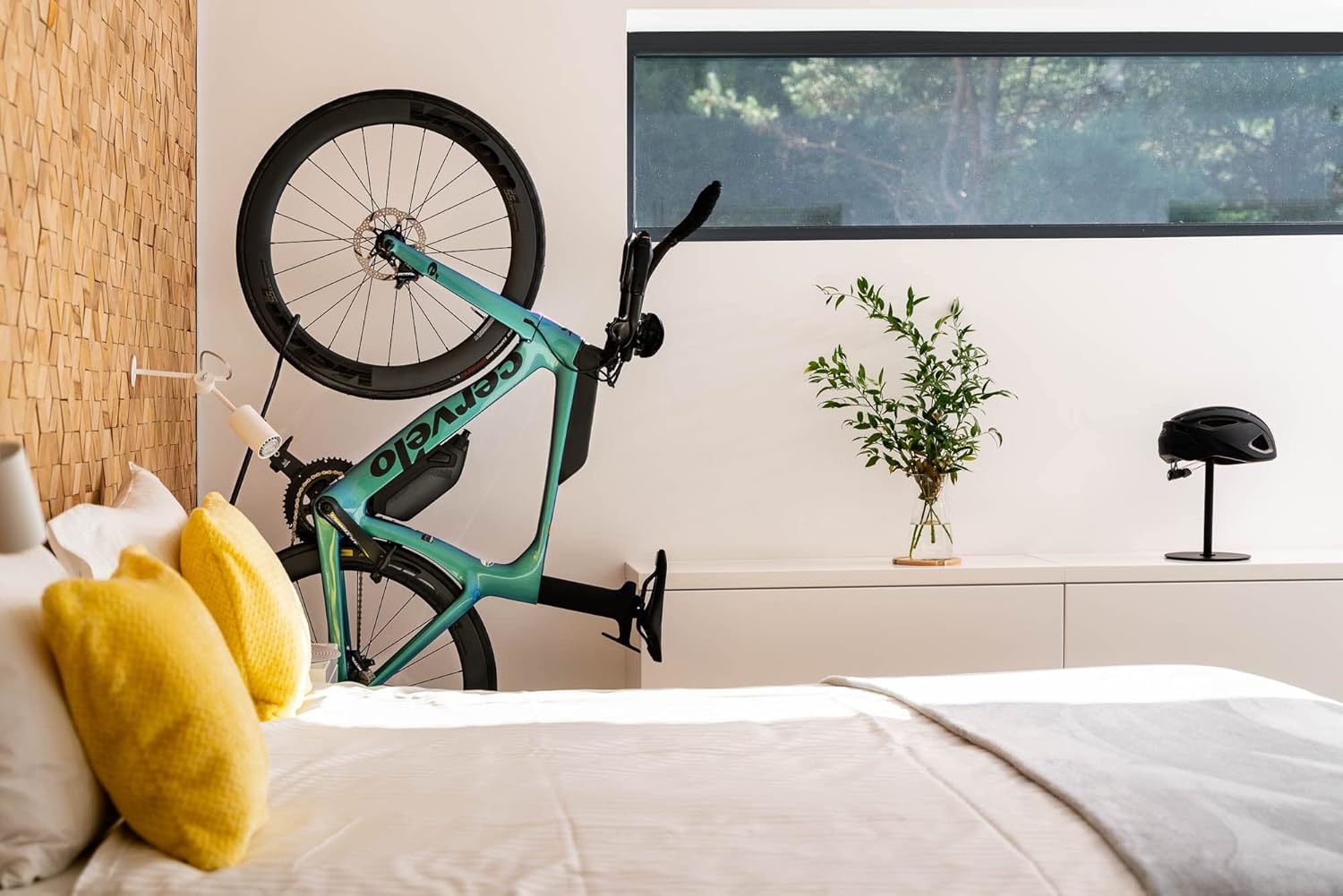Bicycle stored vertically in a home setting