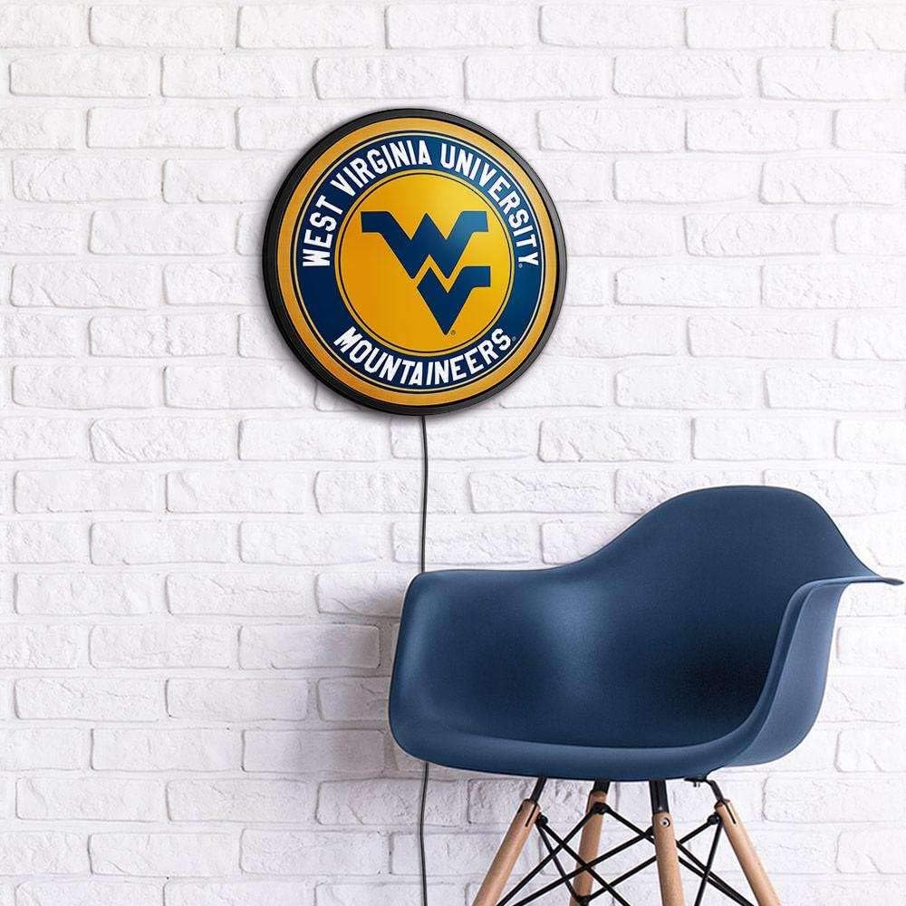The Fan Brands NCAA West Virginia Mountaineers: Round Slimline Lighted Wall Sign, Gold - Sports Team Bar Sign Décor - Home Man Cave, Party Decoration